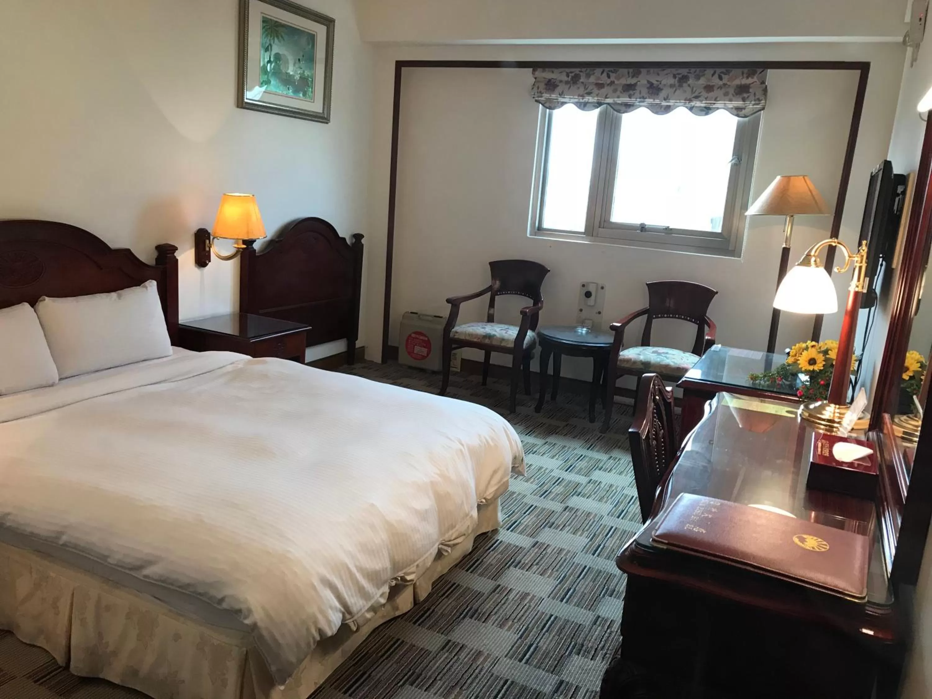 Patio, Bed in Sunrise Hotel