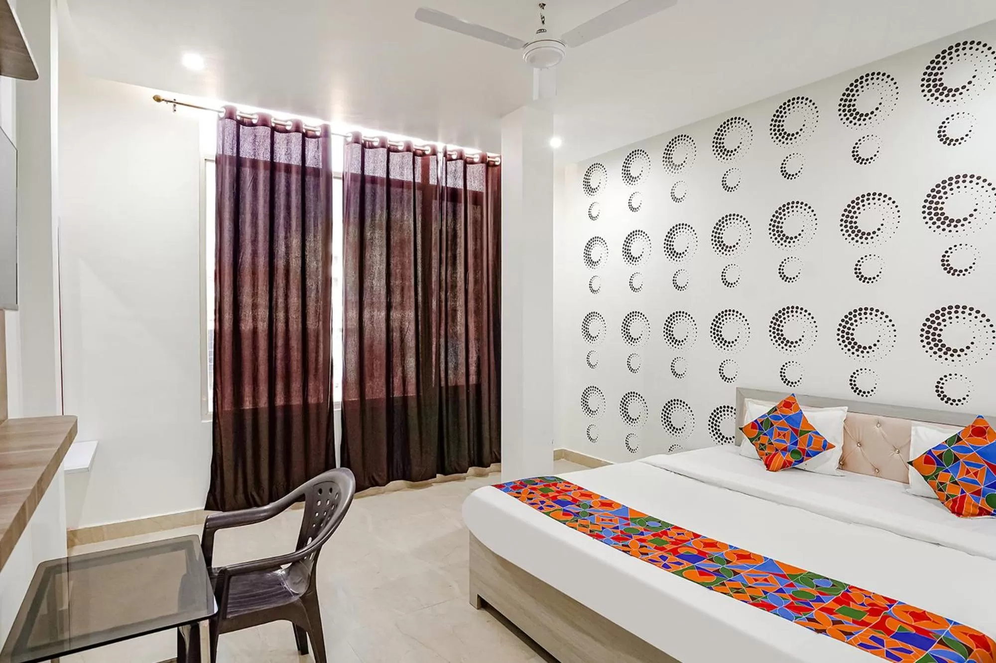 Bed in FabHotel Siddhi