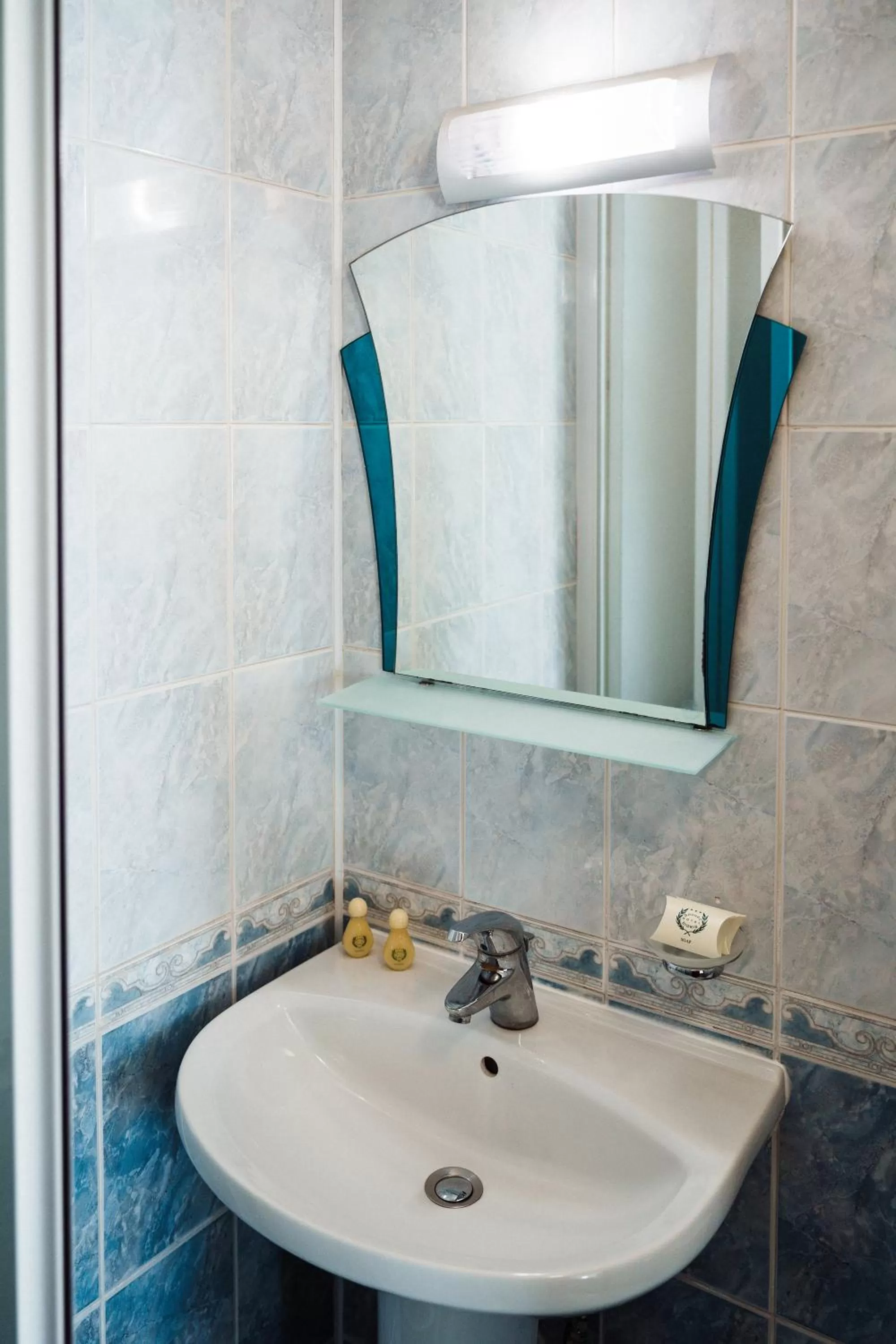 Bathroom in Dionis Hotel