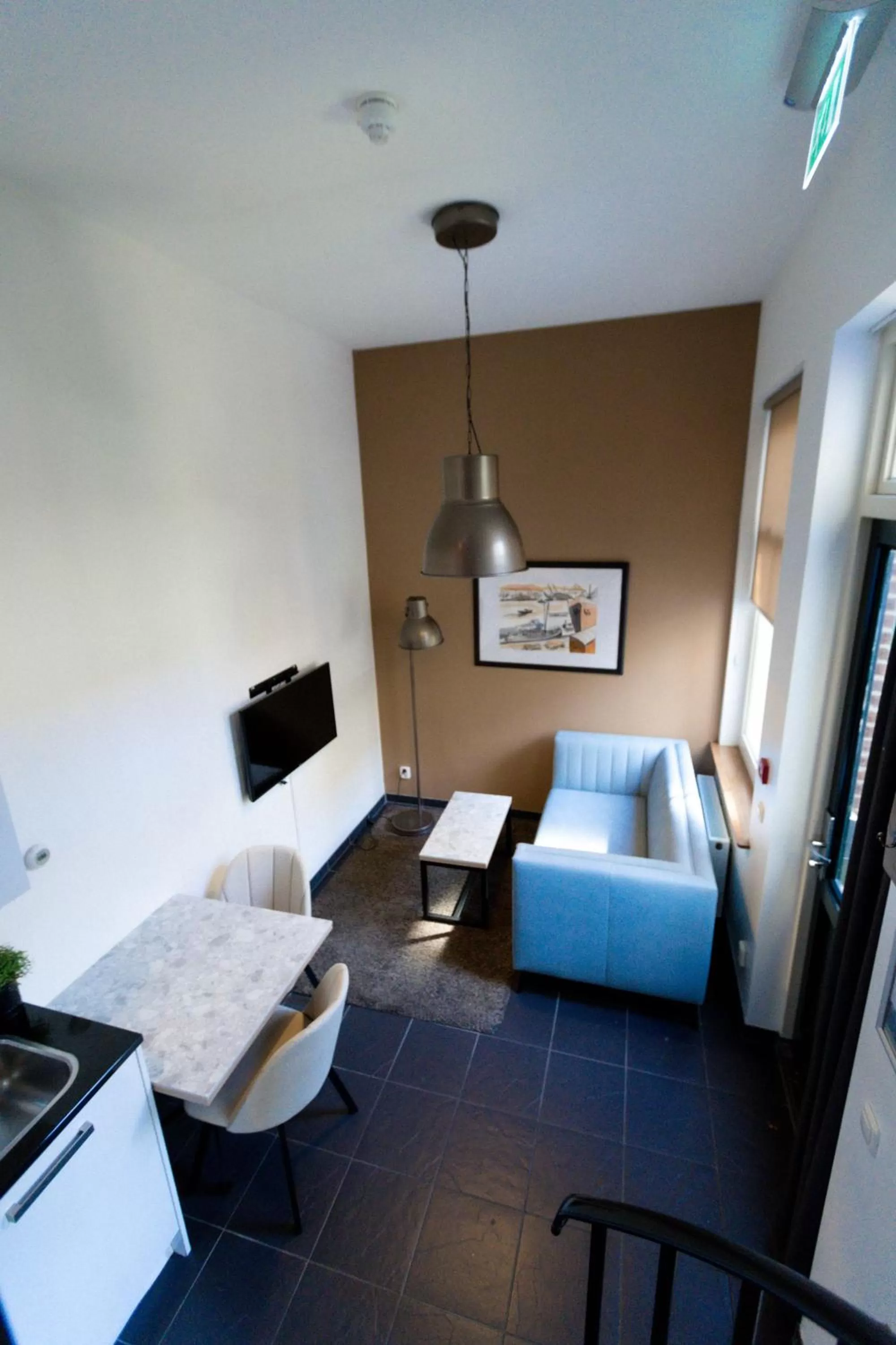 Living room, Bed in Plantage Garden Apartments