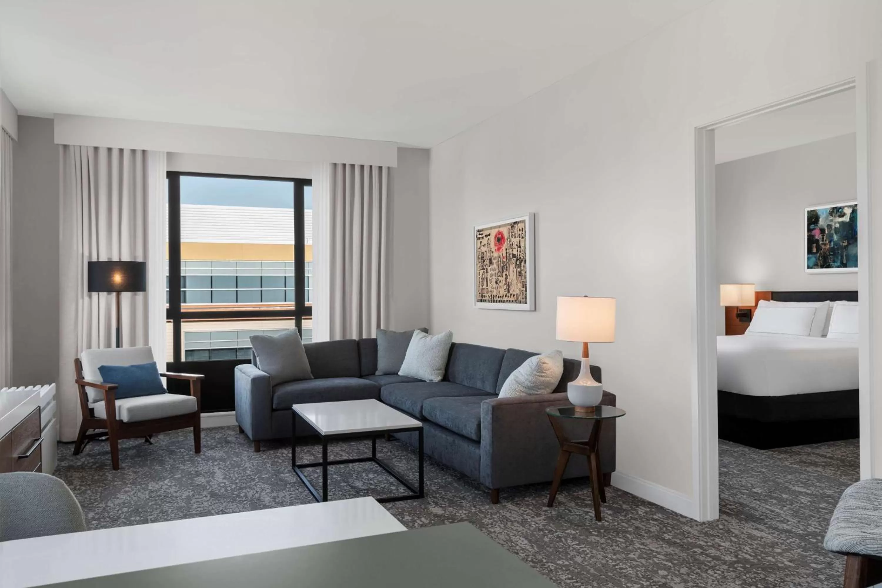 Living room, Bed in Tapestry By Hilton The Fort Sutter Hotel Sacramento, Ca