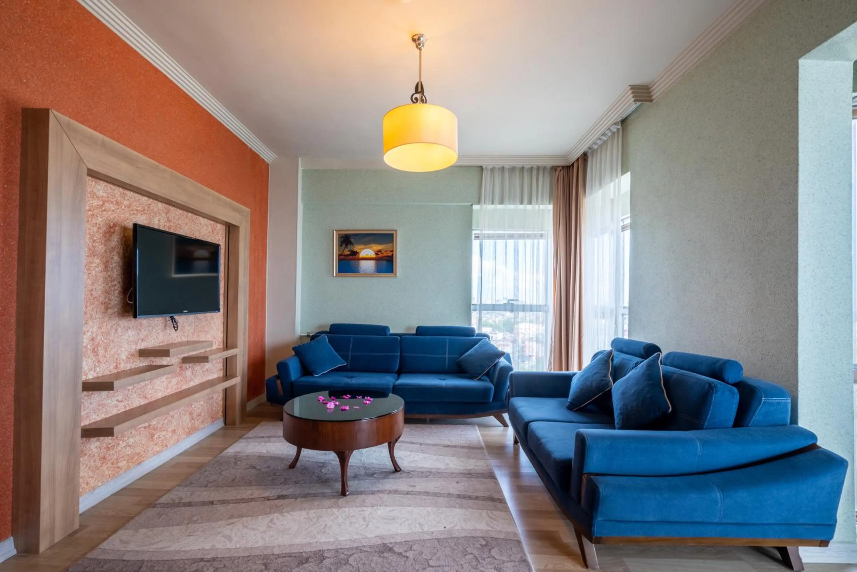 Communal lounge/ TV room in City Live Hotel