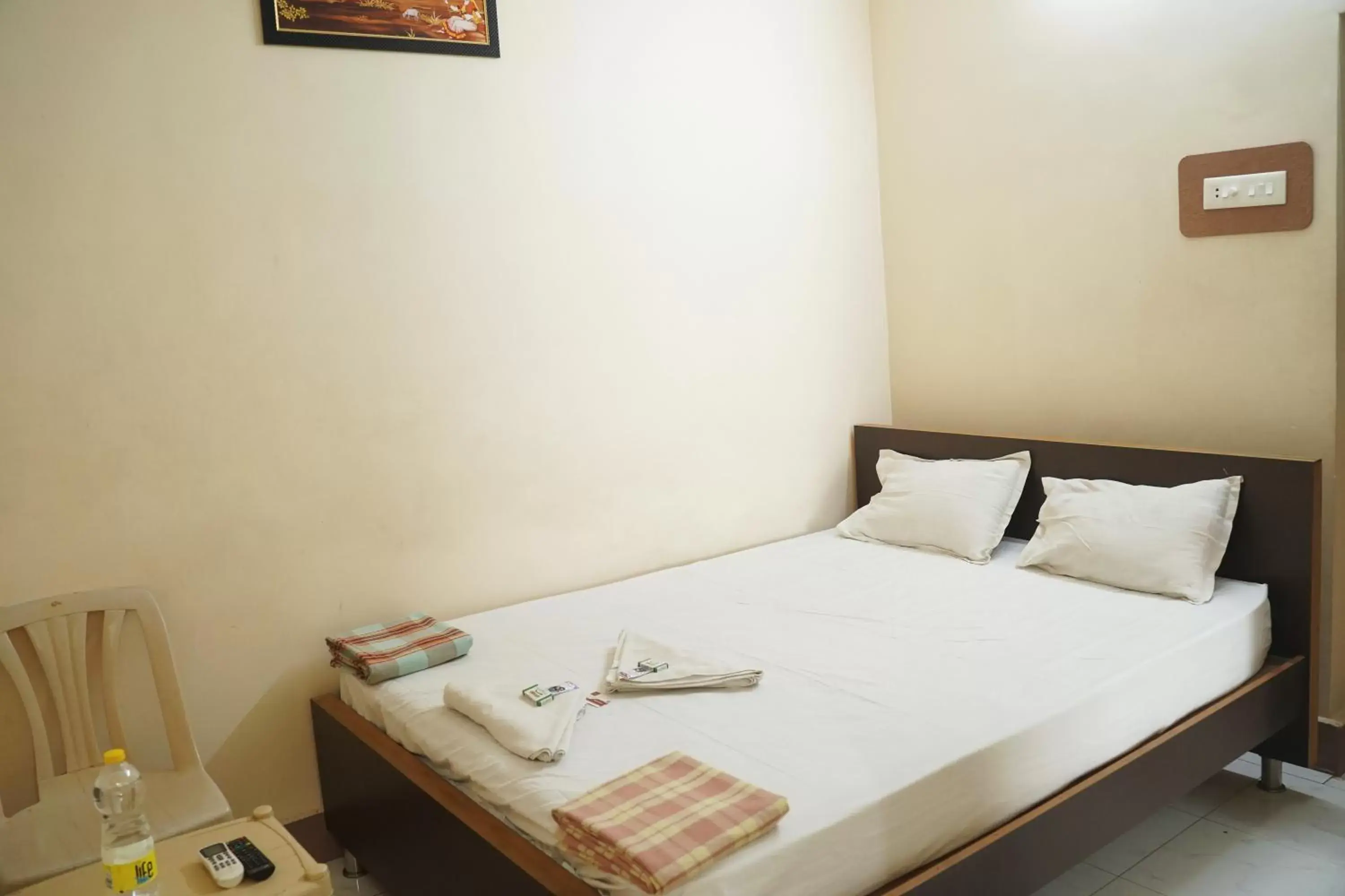 Deluxe Double Room (2 Adults + 1 Child) - single occupancy in SOWMYA LODGE Deluxe Double Room (2 Adults + 1 Child) - single occupancy in SOWMYA LODGE