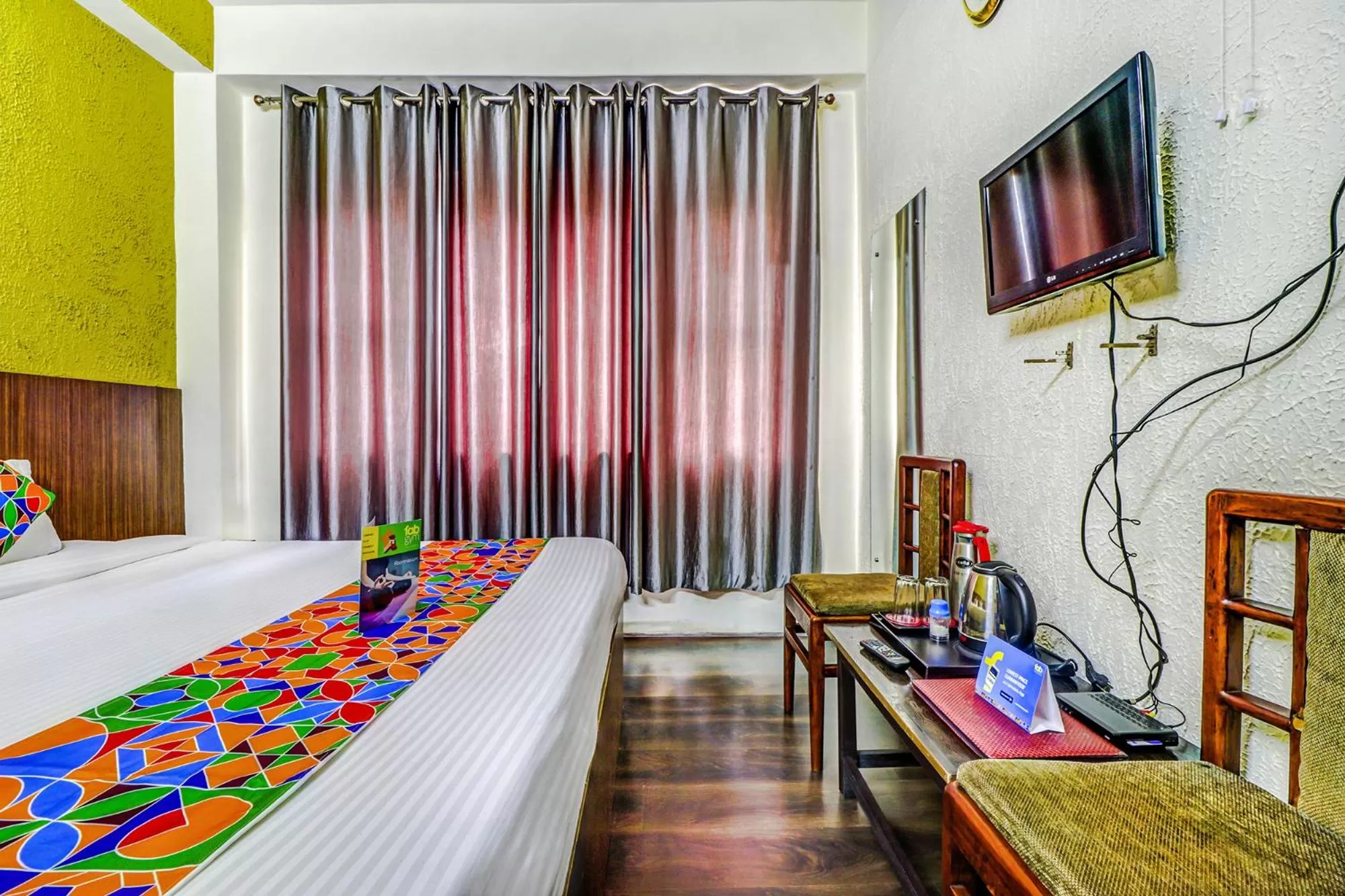 Bedroom in FabHotel Oak Ridge Retreat I
