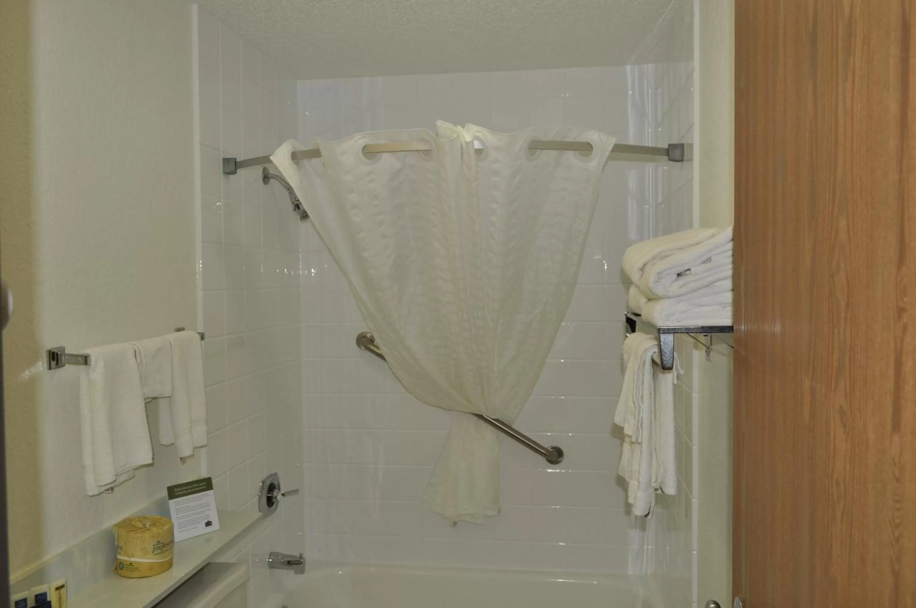 Shower in AmericInn by Wyndham Plymouth