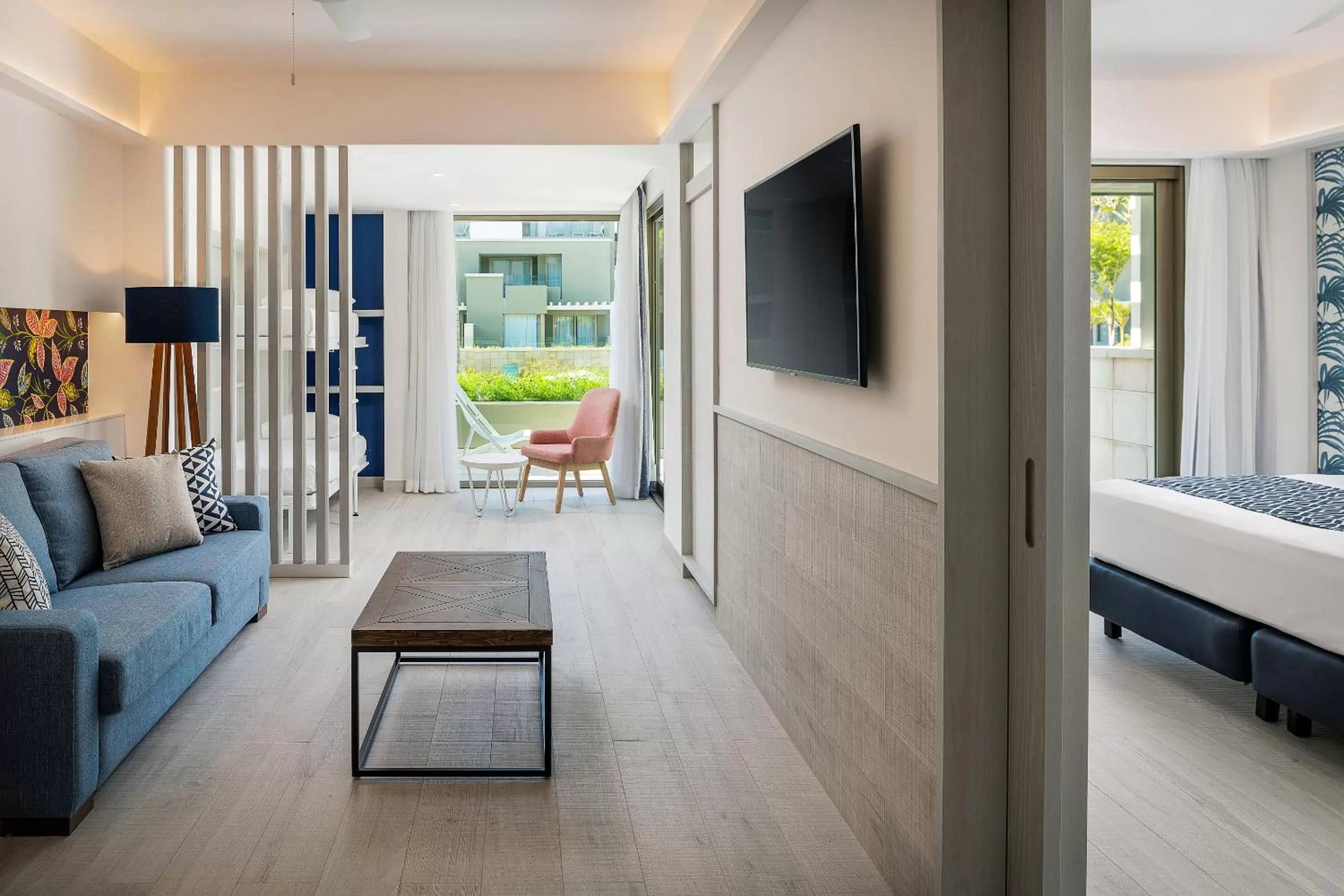 Living room, Bed in Catalonia Grand Costa Mujeres All Suites & Spa - All Inclusive