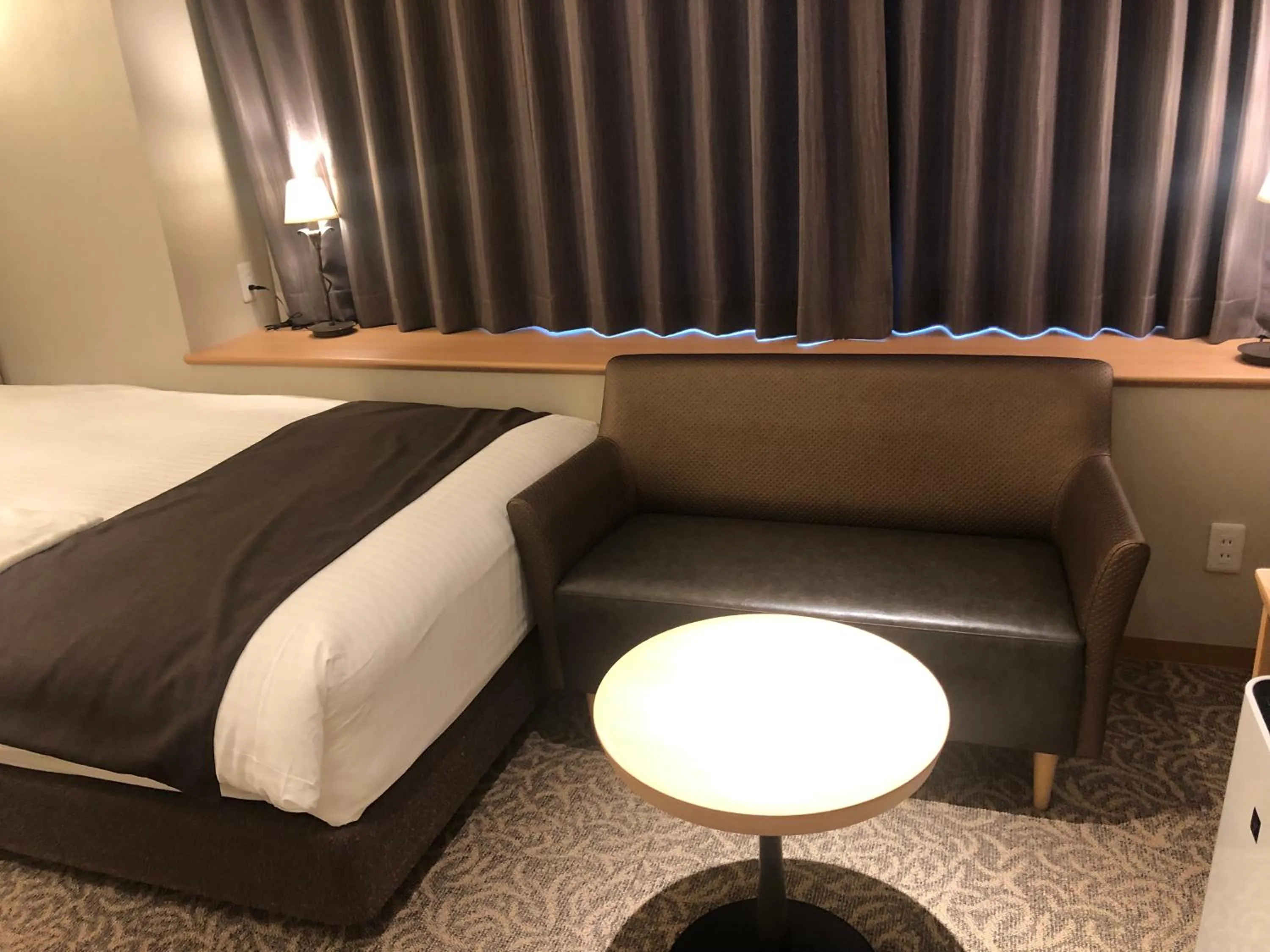 Seating area, Bed in Kobe Luminous Hotel Sannomiya