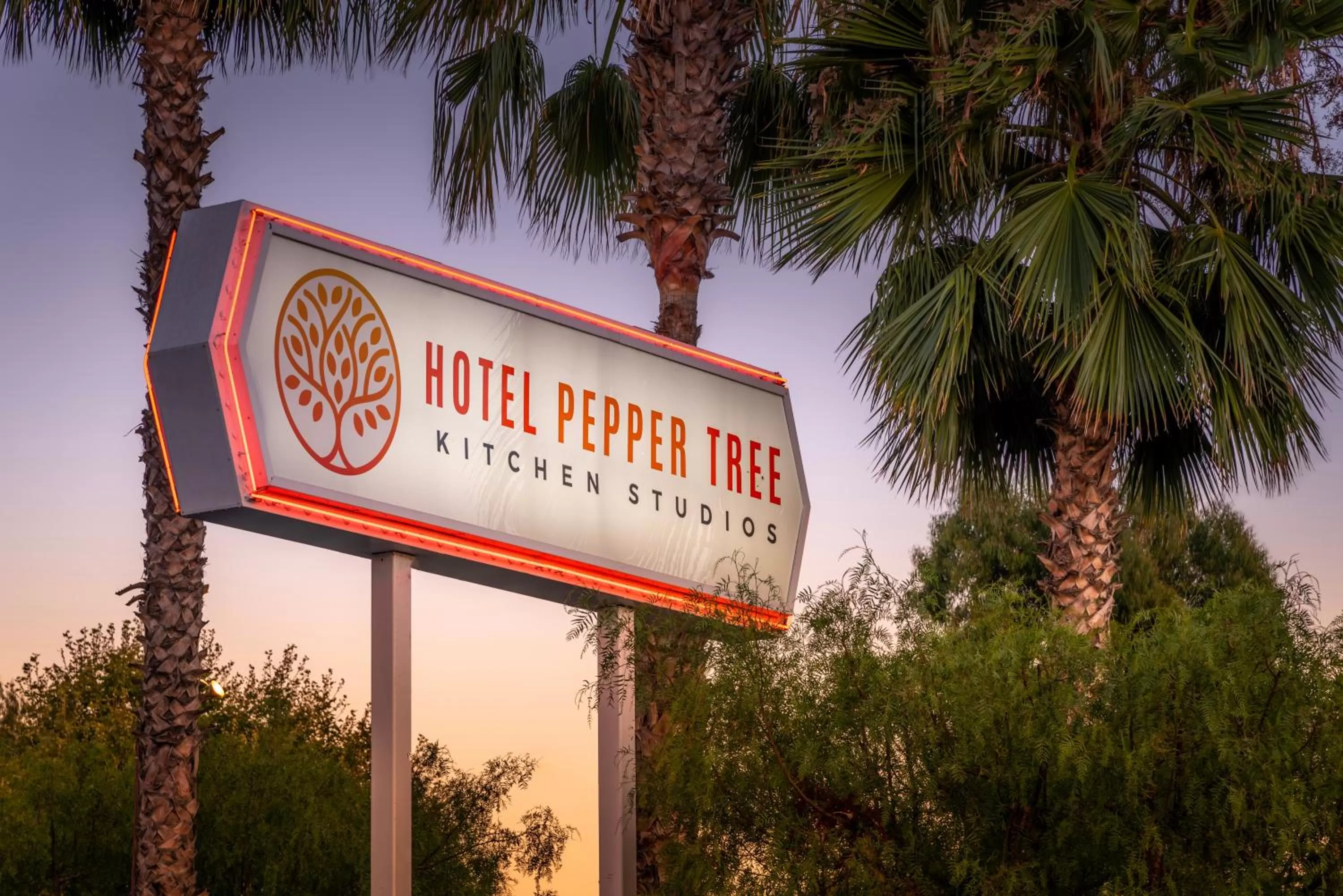 Property logo or sign in Hotel Pepper Tree Boutique Kitchen Studios - Anaheim