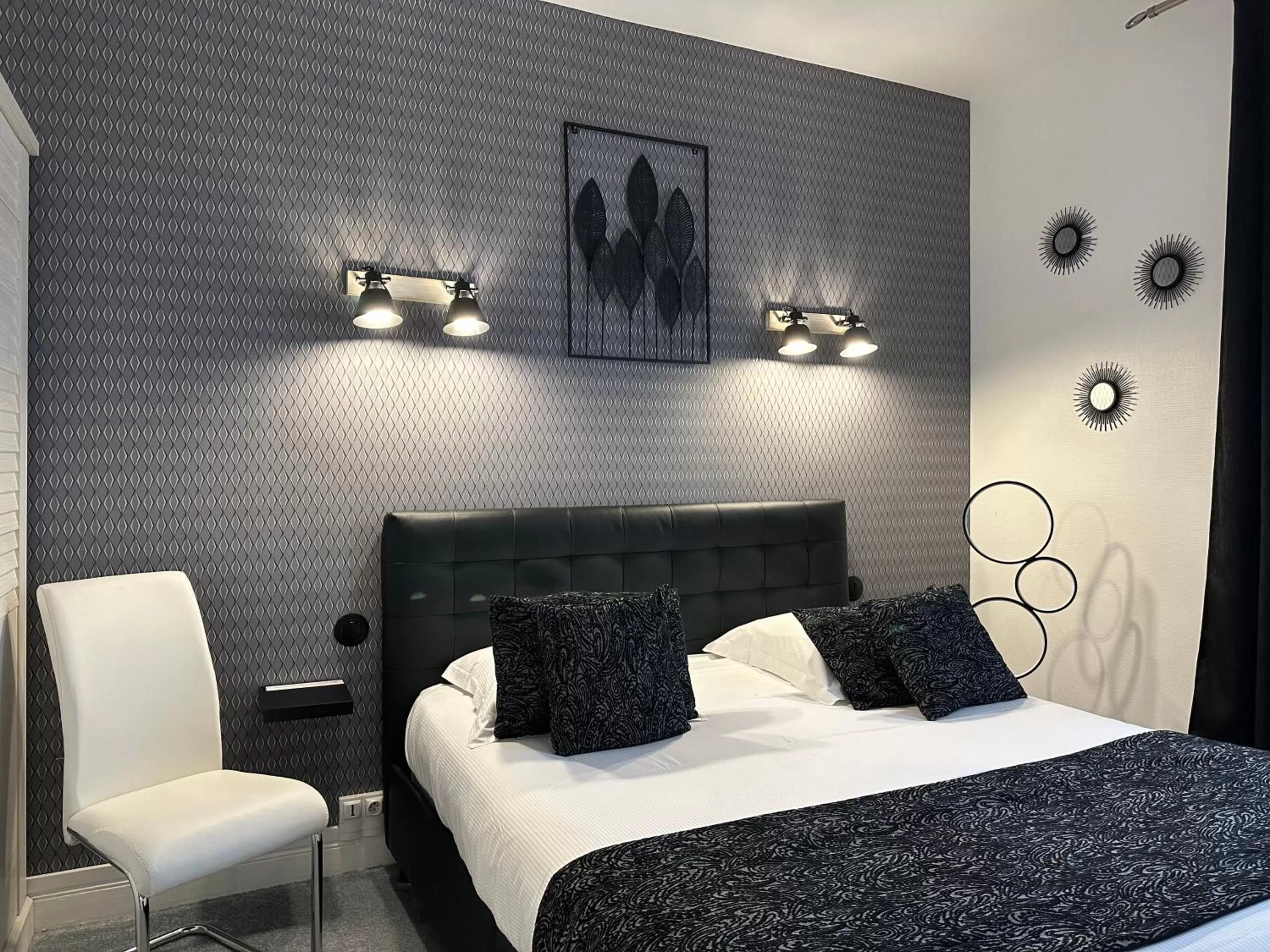 Bed in Hotel Le Saint-Yves