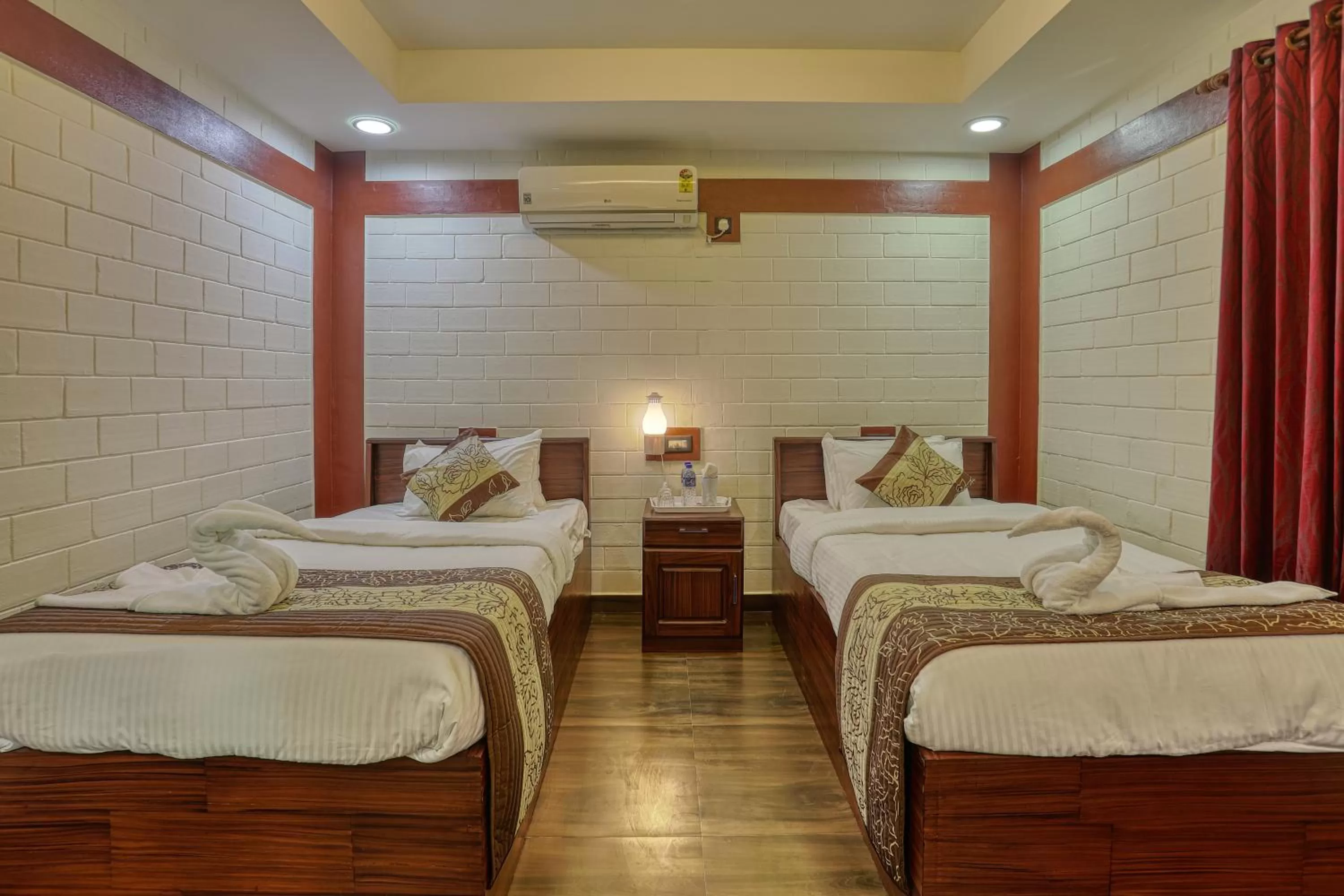 Bed in LEISURE VALLEY BEACH RESORT