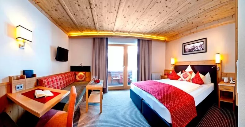 Photo of the whole room, Bed in Hotel Bergkristall