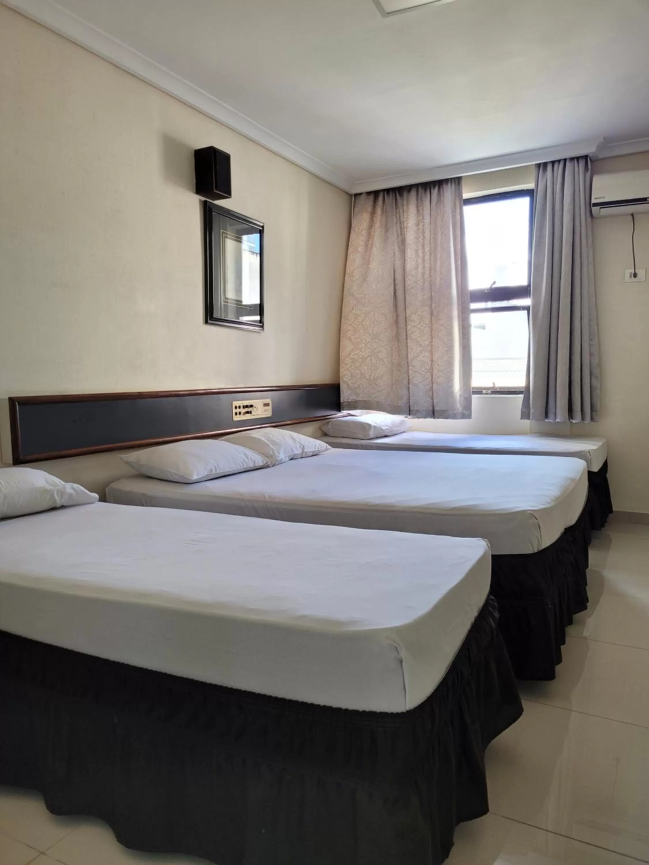 Bed in Hotel Estação Express