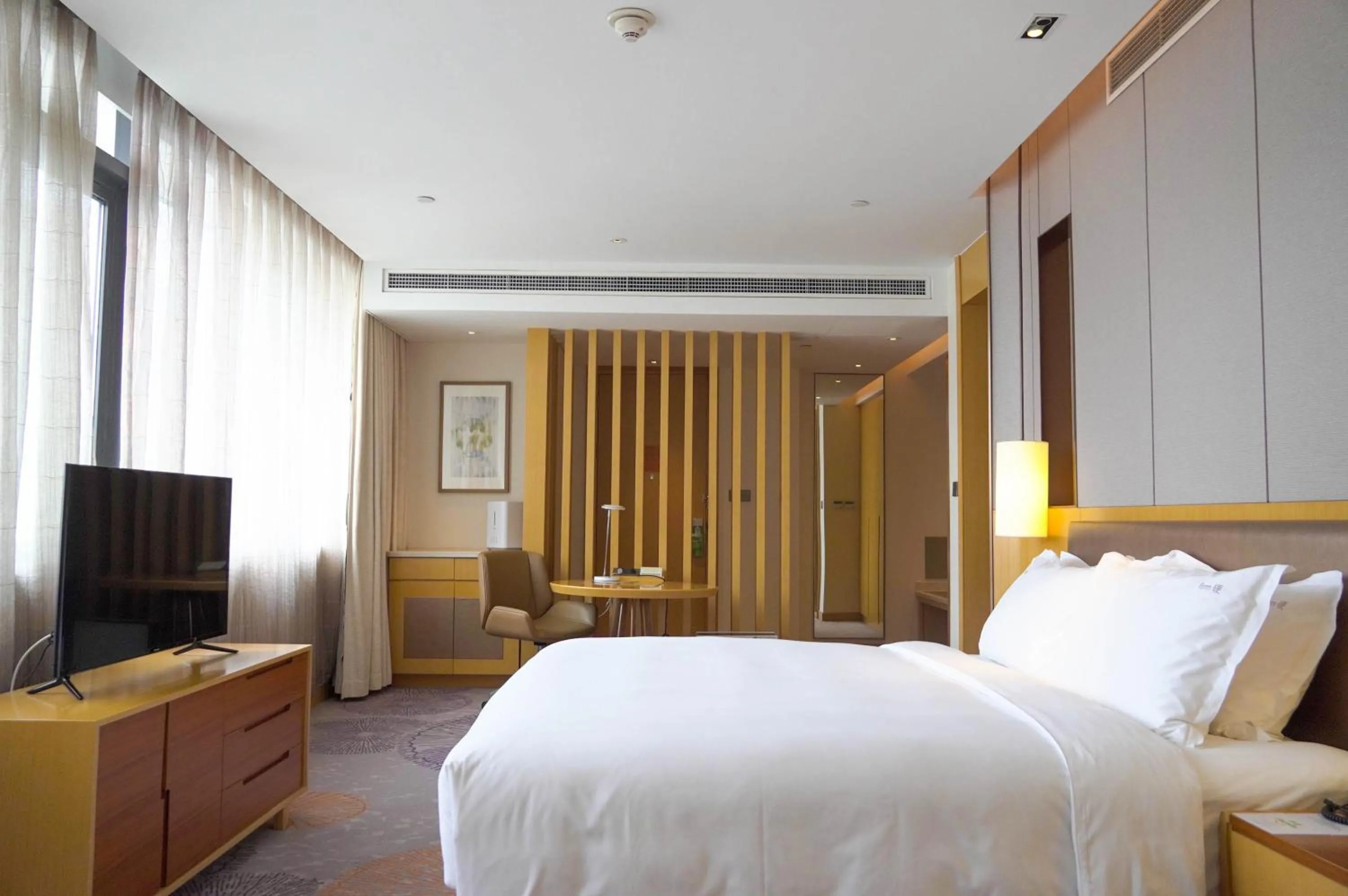 Bed in Holiday Inn Tianjin Xiqing by IHG