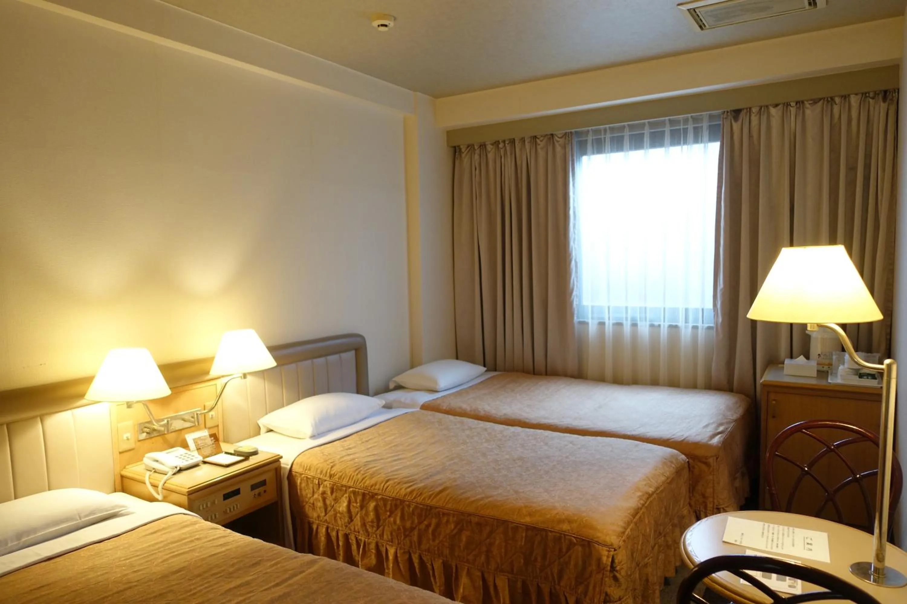 Bed in Urayasu Beaufort Hotel