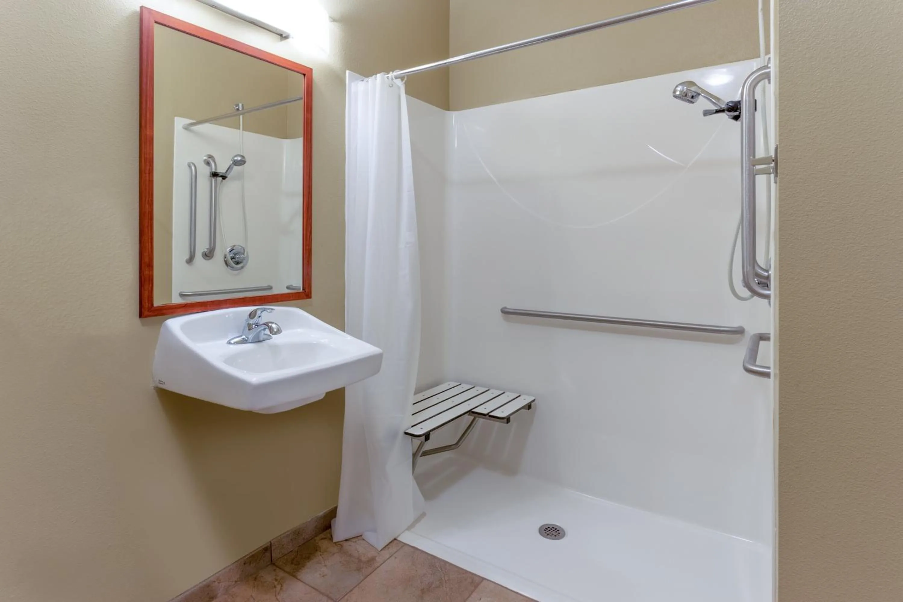 Bathroom in Candlewood Suites Minot by IHG