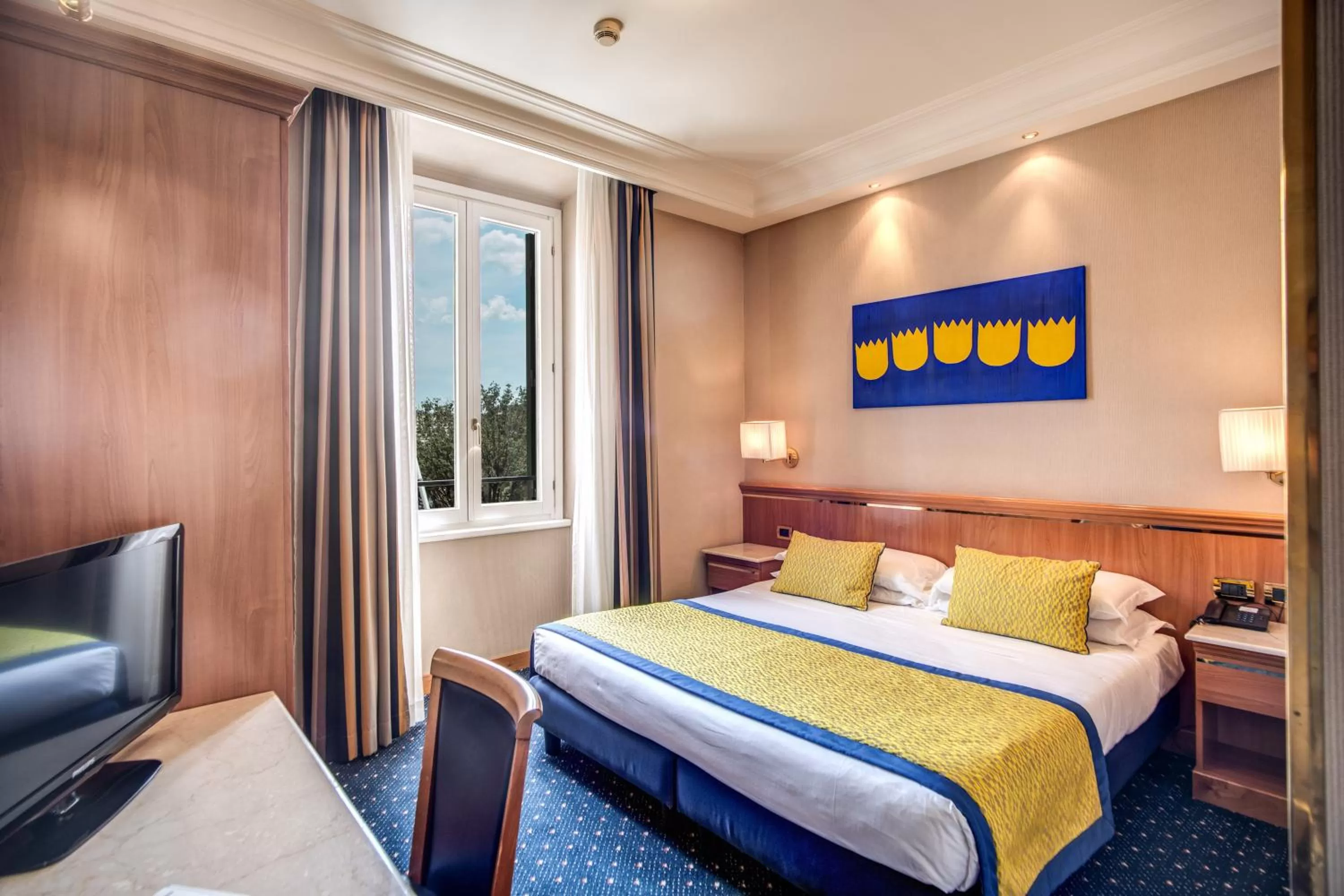 Bed in Hotel Diocleziano