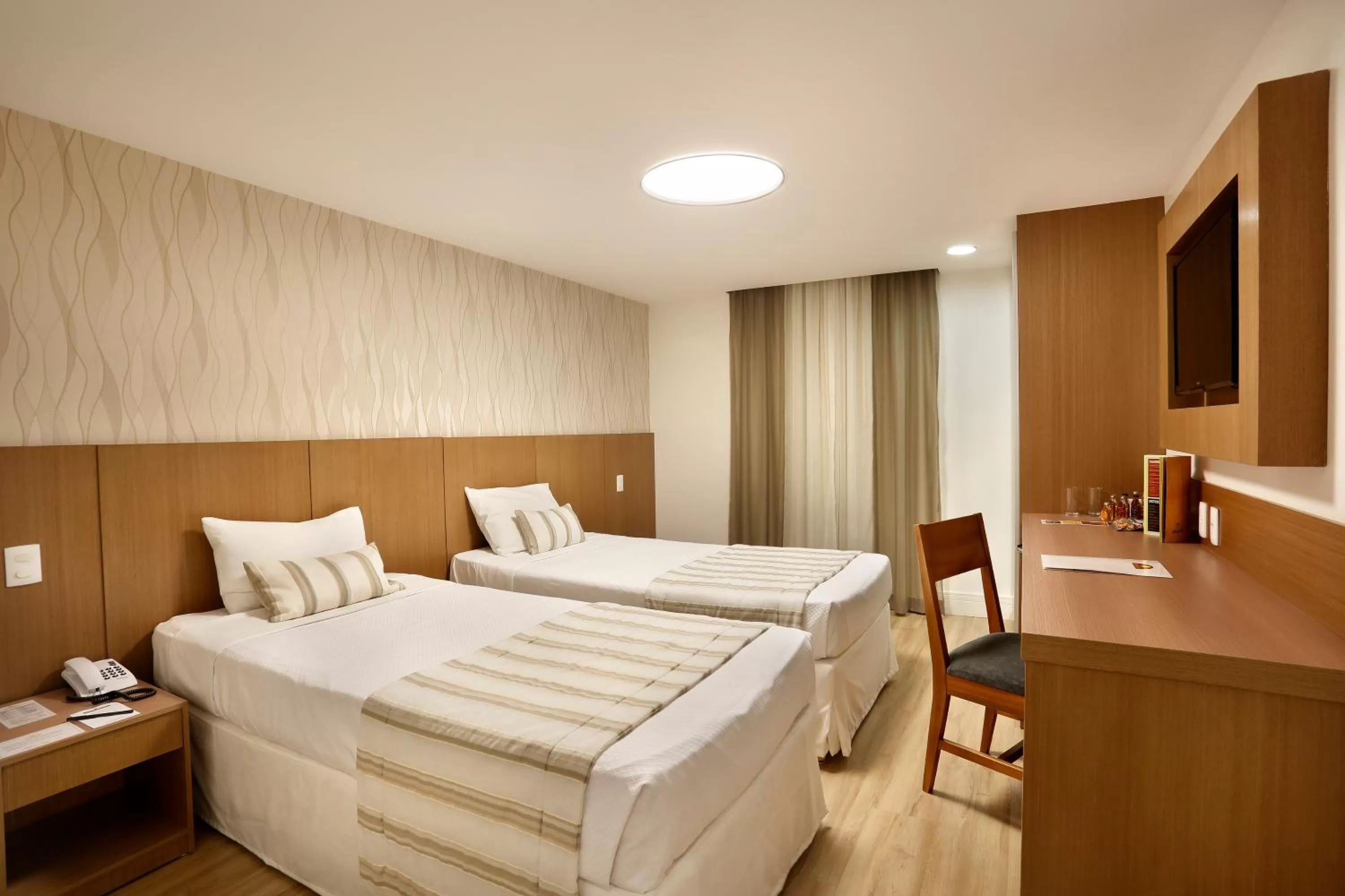 Bed in Mirasol Copacabana Hotel