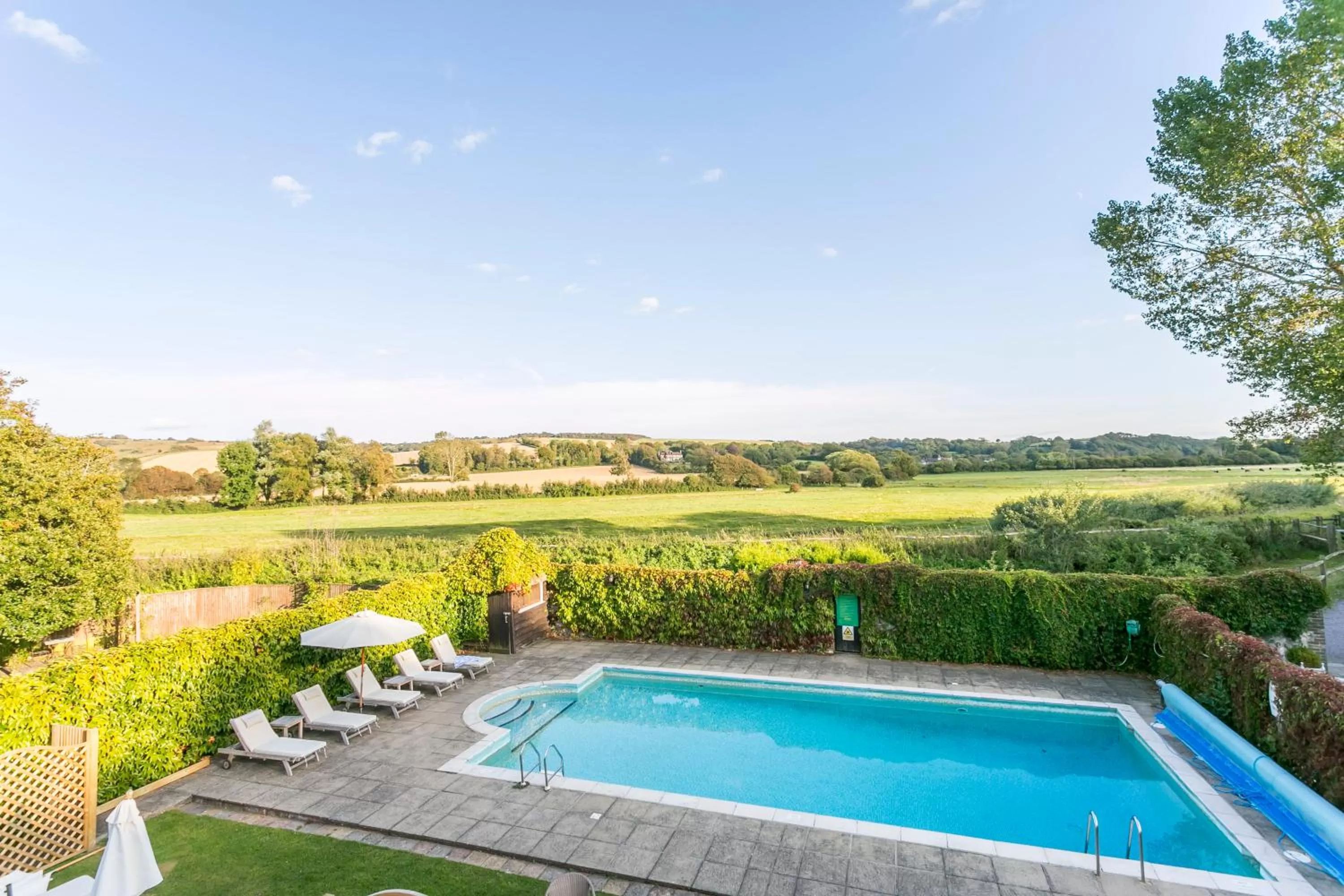 Patio, Swimming Pool in Deans Place Hotel