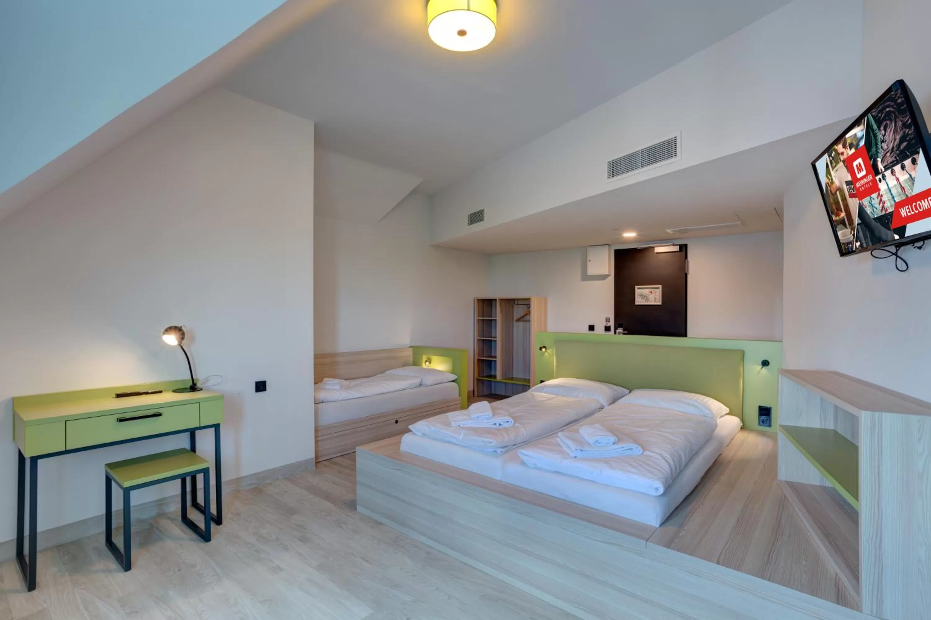 Photo of the whole room, Bed in MEININGER Hotel München Olympiapark