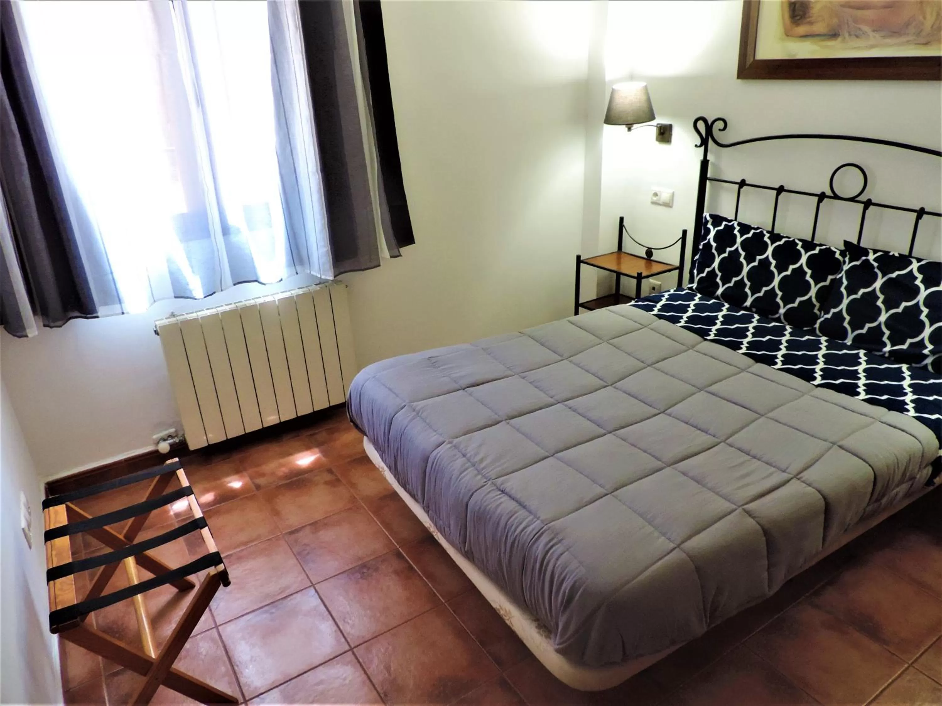 Bed in APARTAMENTOS CASERIA DE COMARES