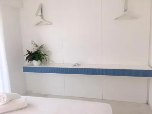 Photo of the whole room, Bed in S'O Suites Tropea