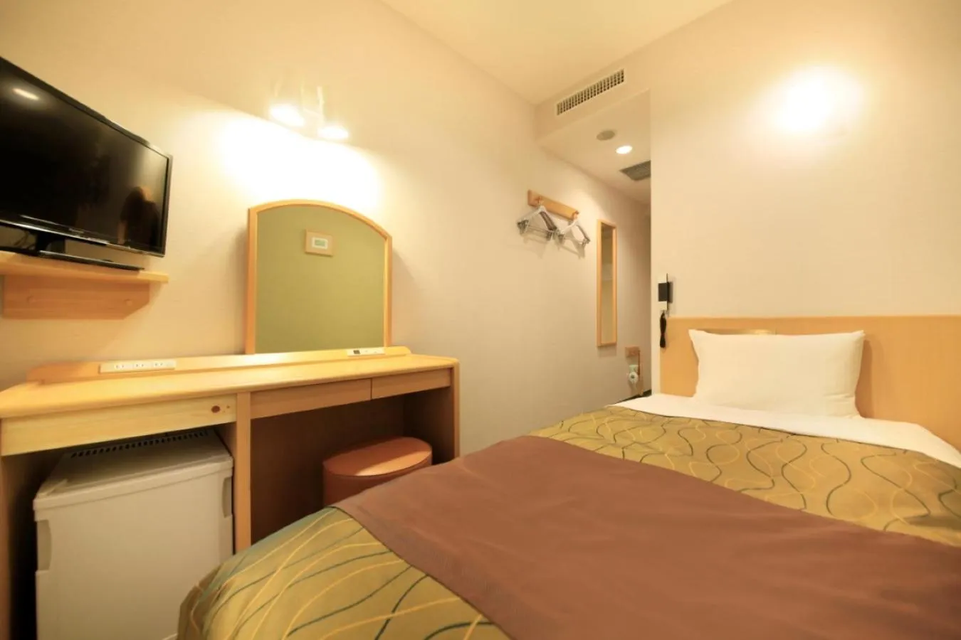 Bed in Hotel Grand City