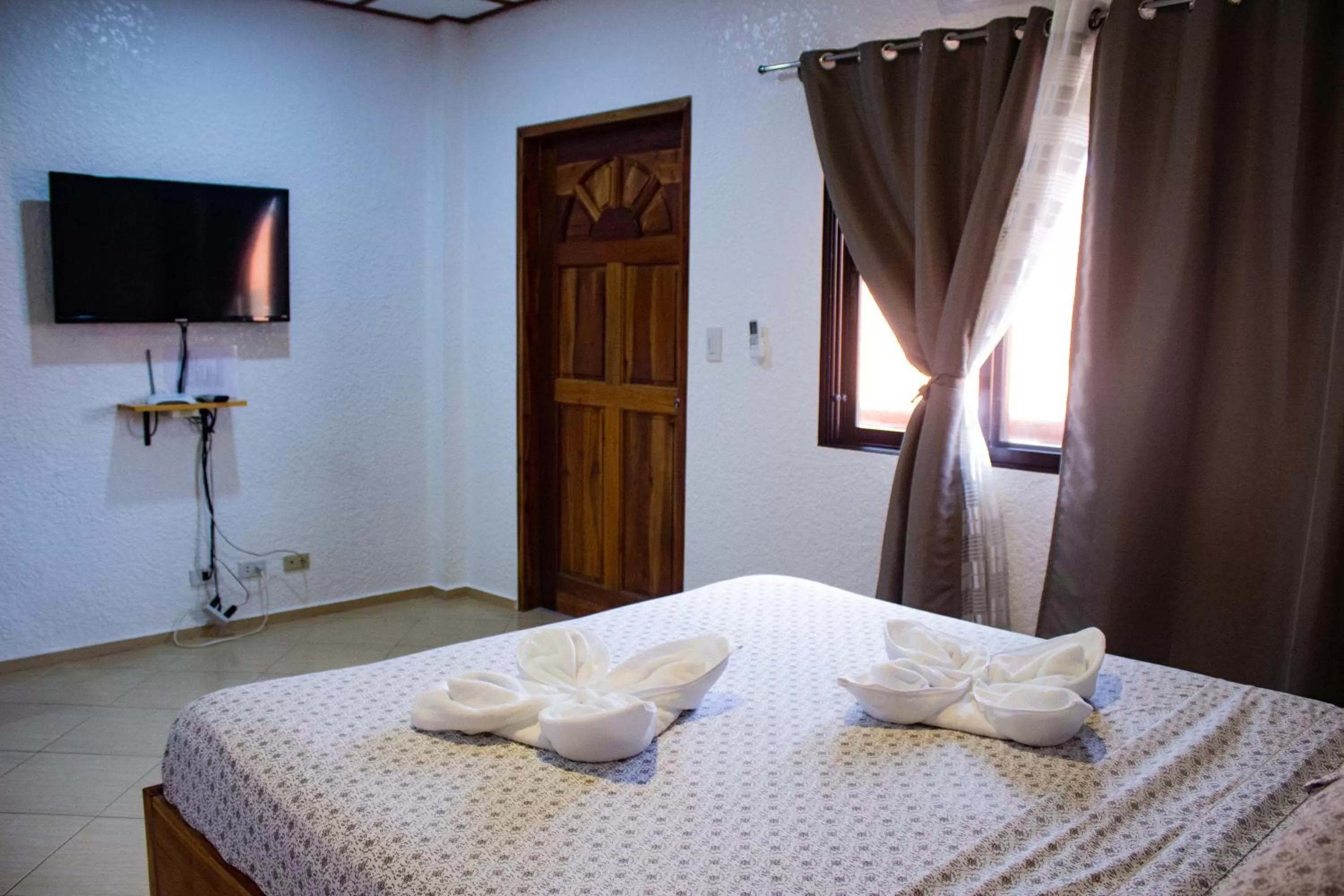 Bed in Jugalis Hotel and Restaurant