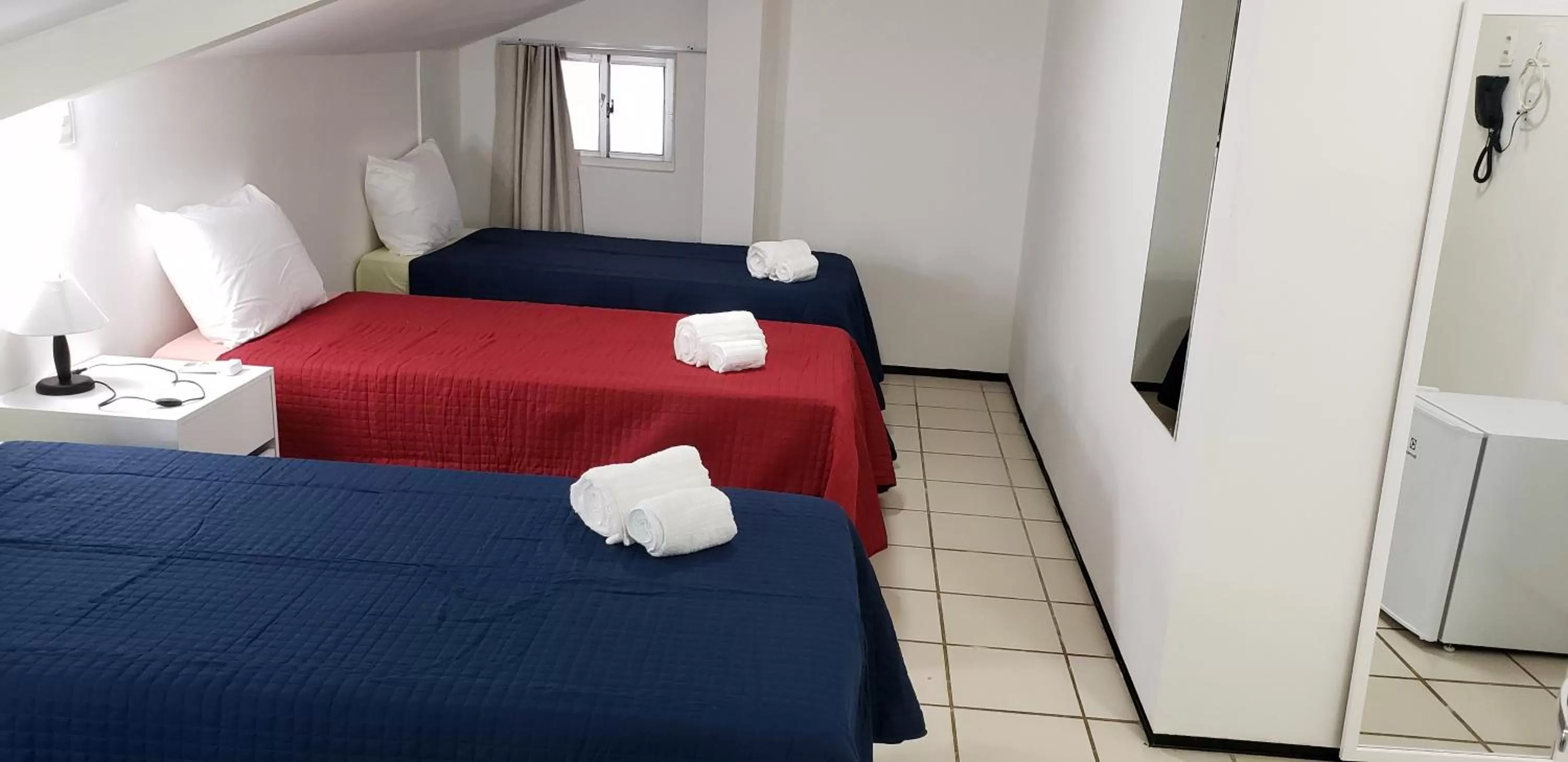 Bed in LIVE IN FORTALEZA HOTEL