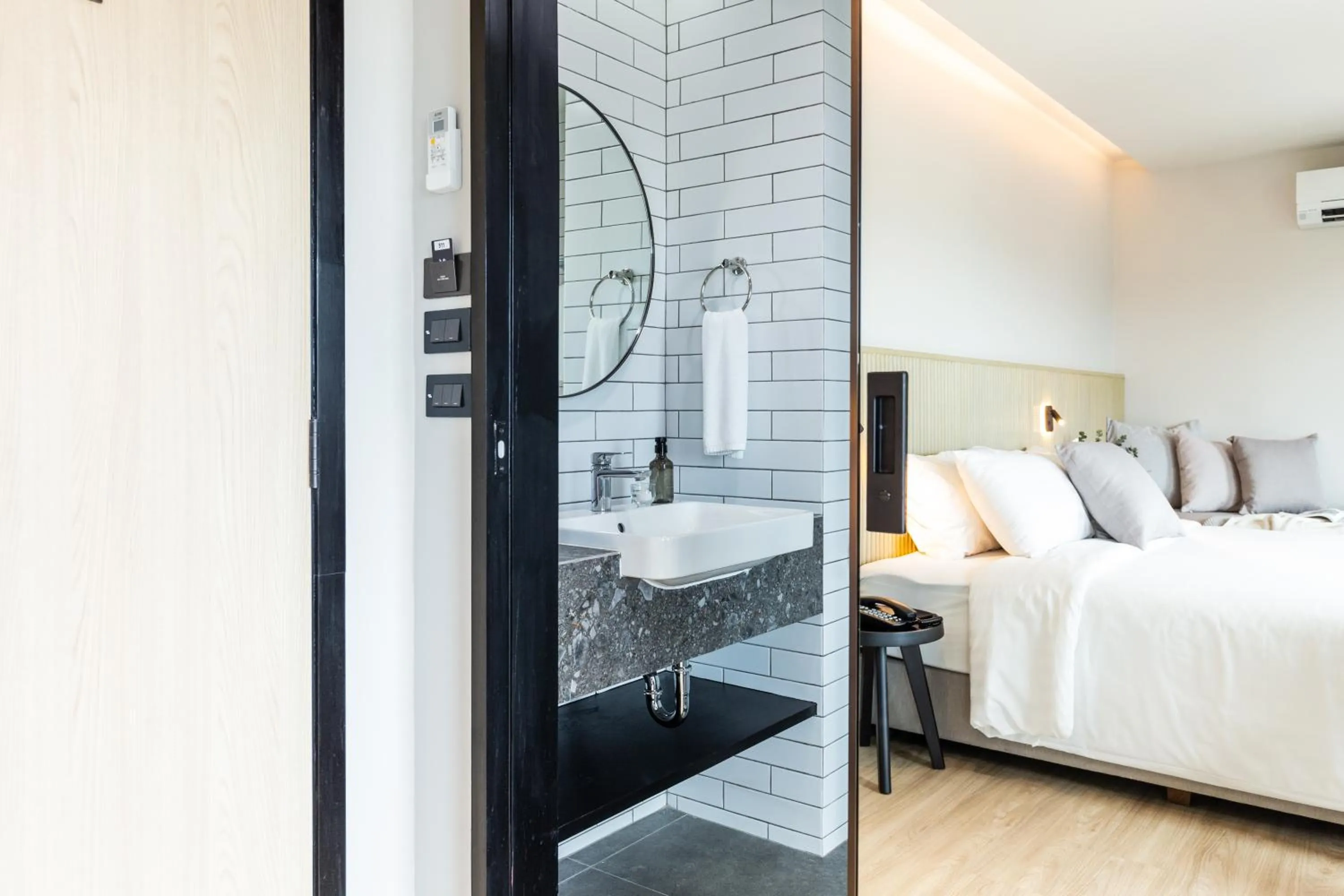 Toilet, Bed in Mii Hotel Srinakarin