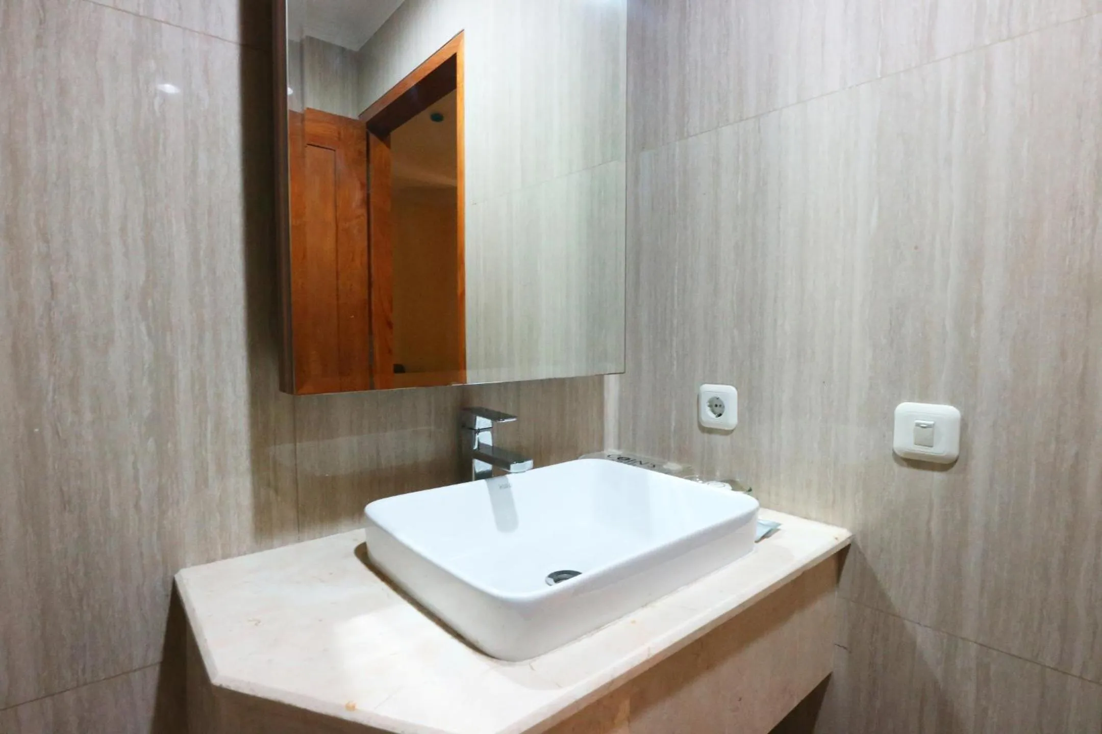 Bathroom in Coins Hotel Jakarta