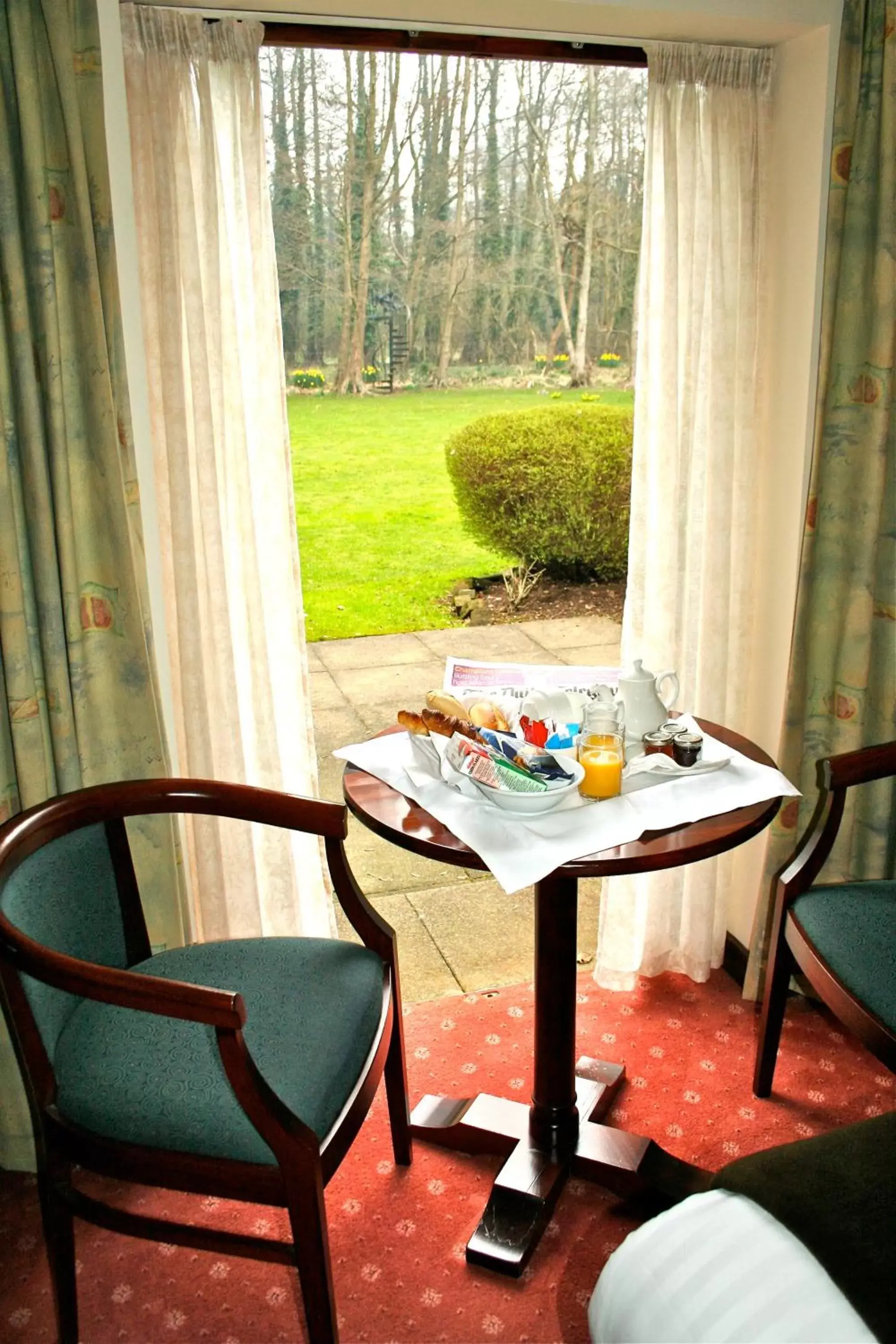 Garden Room in Ellington Lodge at The Concorde Garden Room in Ellington Lodge at The Concorde