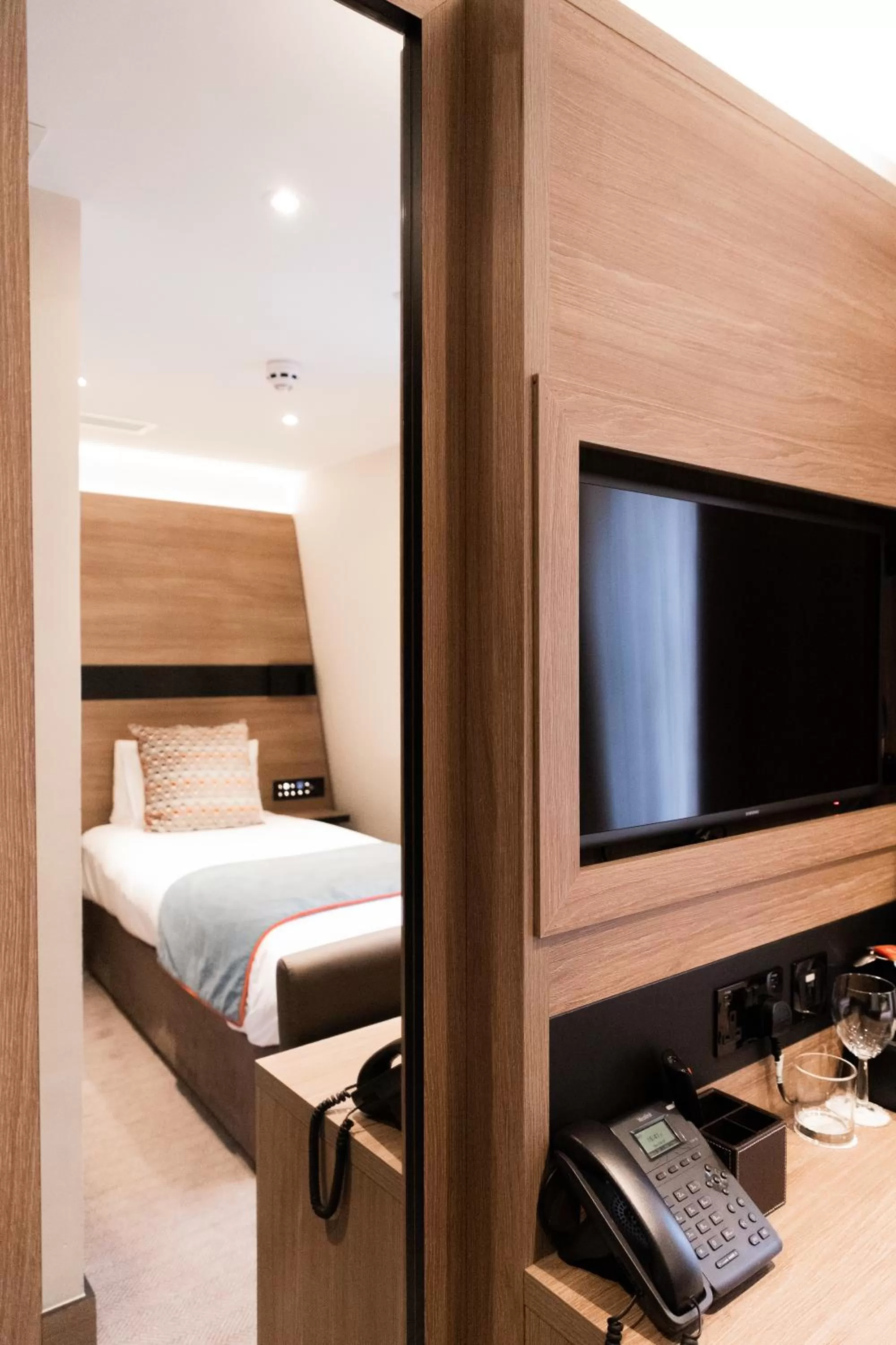 Bed in Merit Kensington Hotel