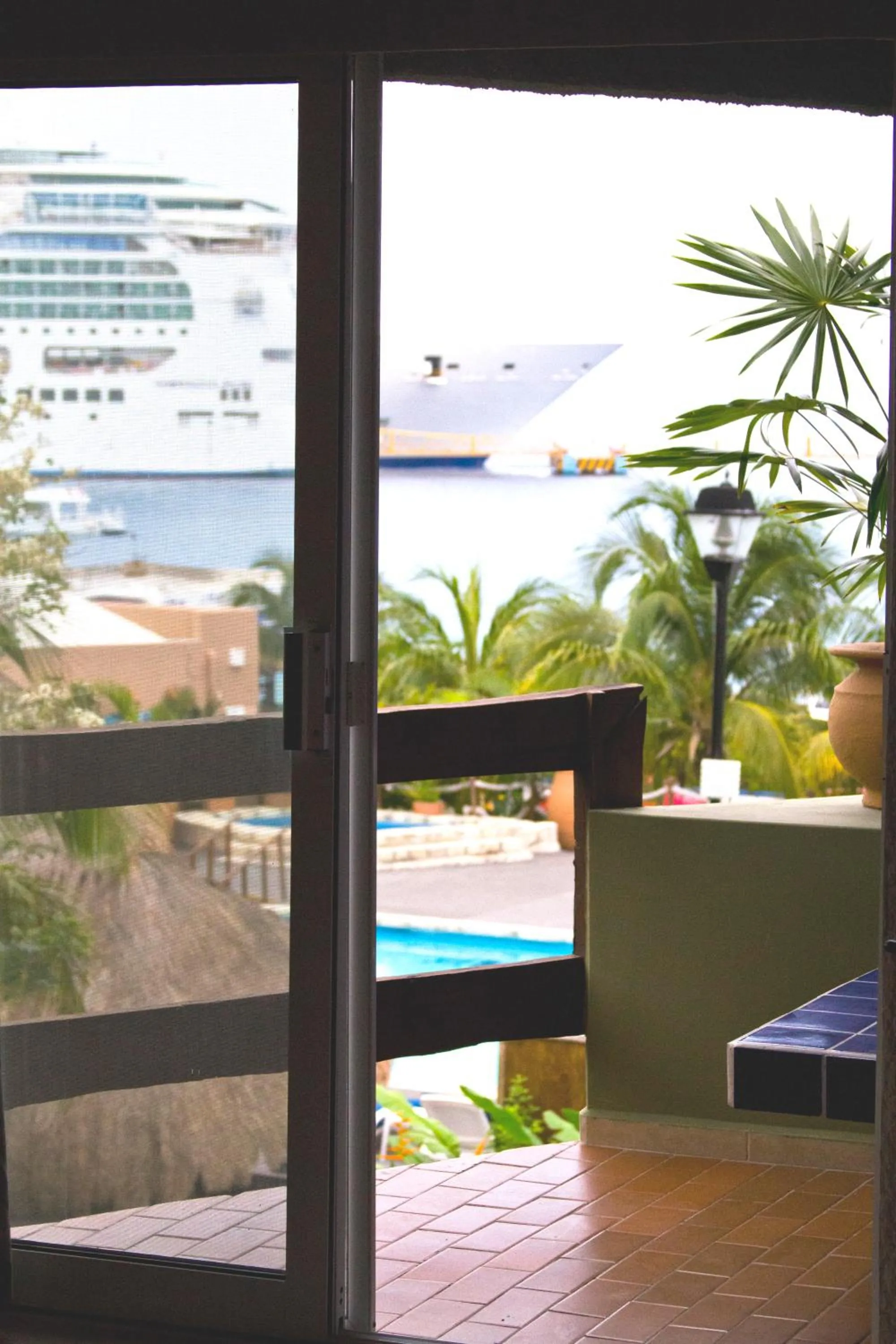 Pool view in Casa del Mar Cozumel Hotel & Dive Resort with free access to an exclusive beach club