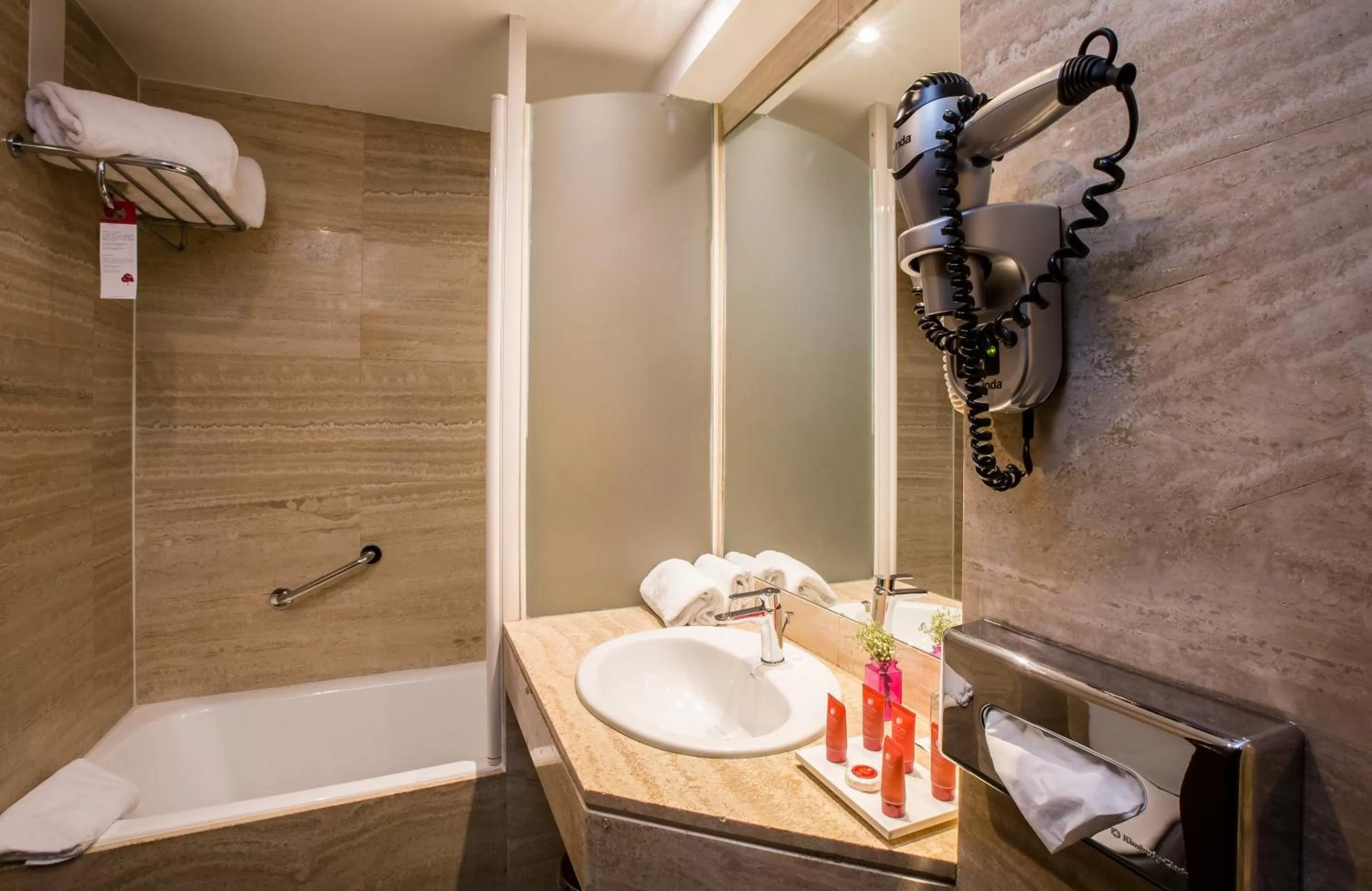 Bathroom in Leonardo Hotel Madrid City Center