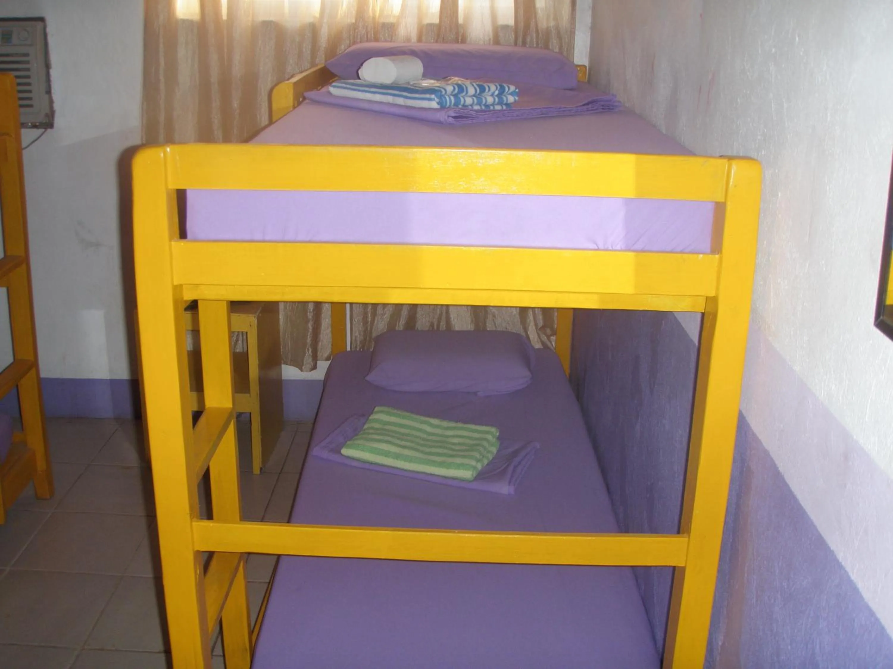 Bed in Anthurium Inn