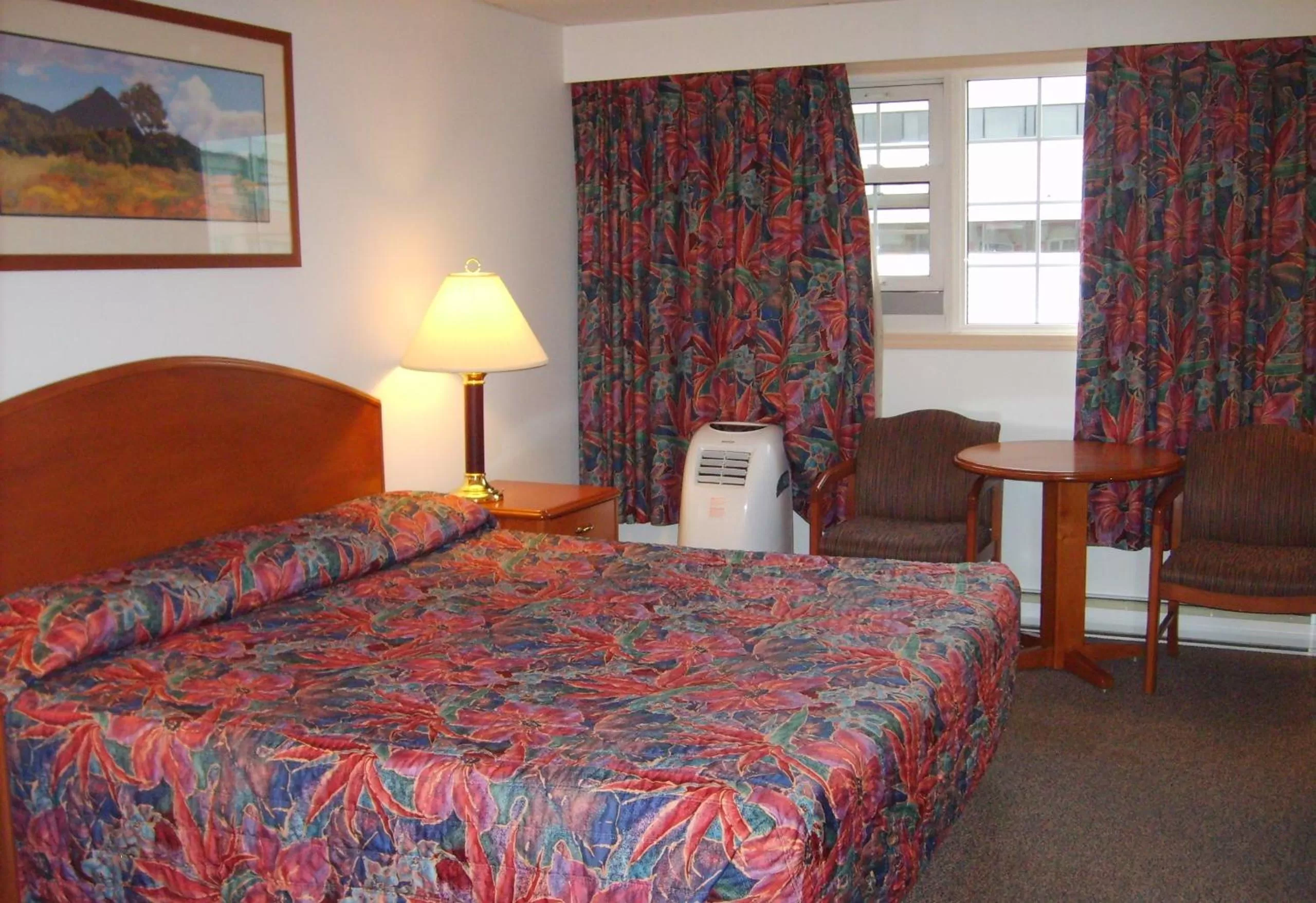 Bedroom in Town and Mountain Hotel