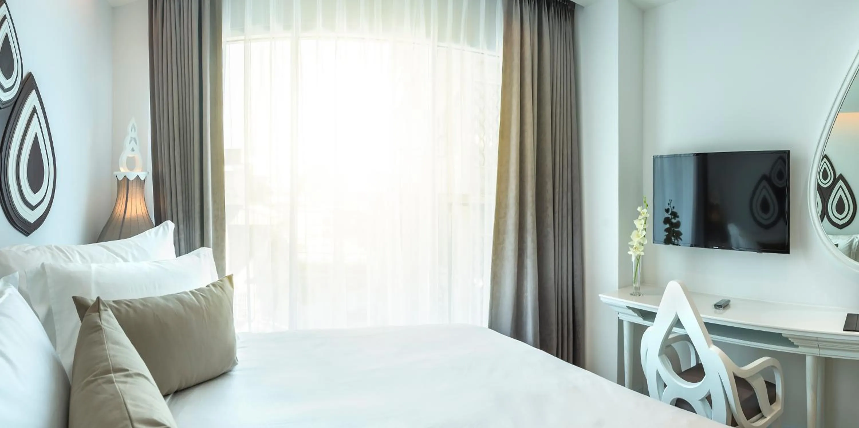 Decorative detail, Bed in Anajak Bangkok Hotel - SHA Plus