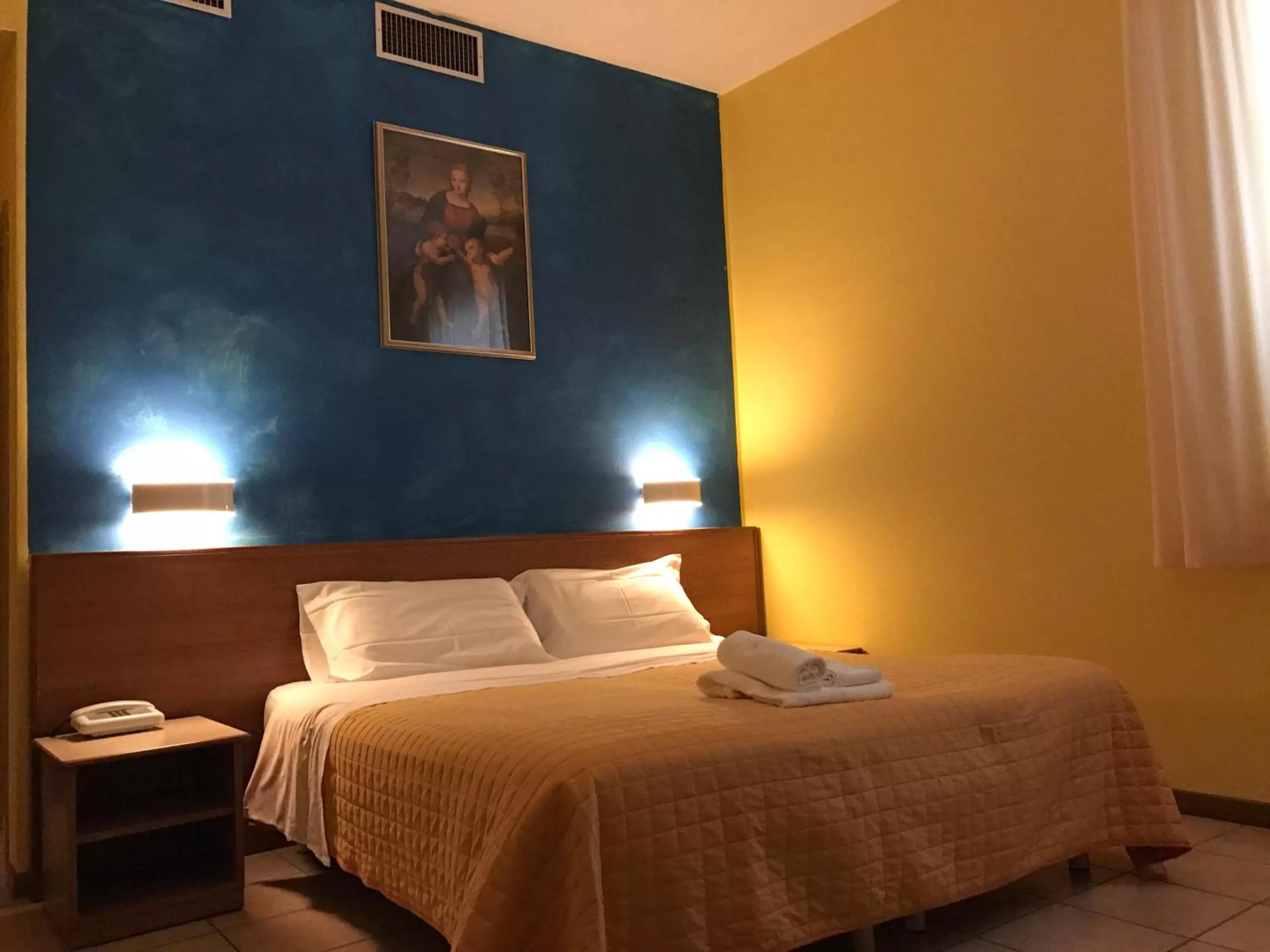Bed in Hotel Pellegrino E Pace