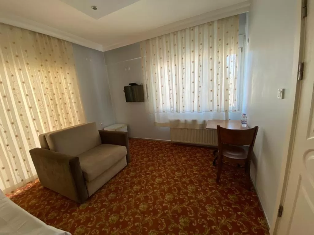 Seating area, Bed in Sakran Hotel