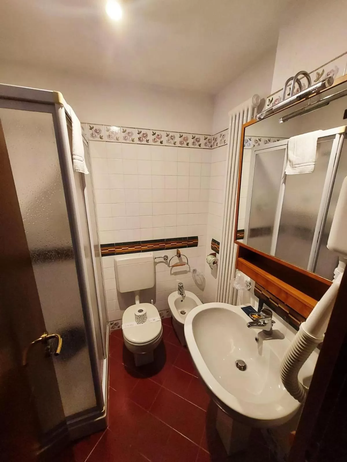 Bathroom in HG Hotel Italia