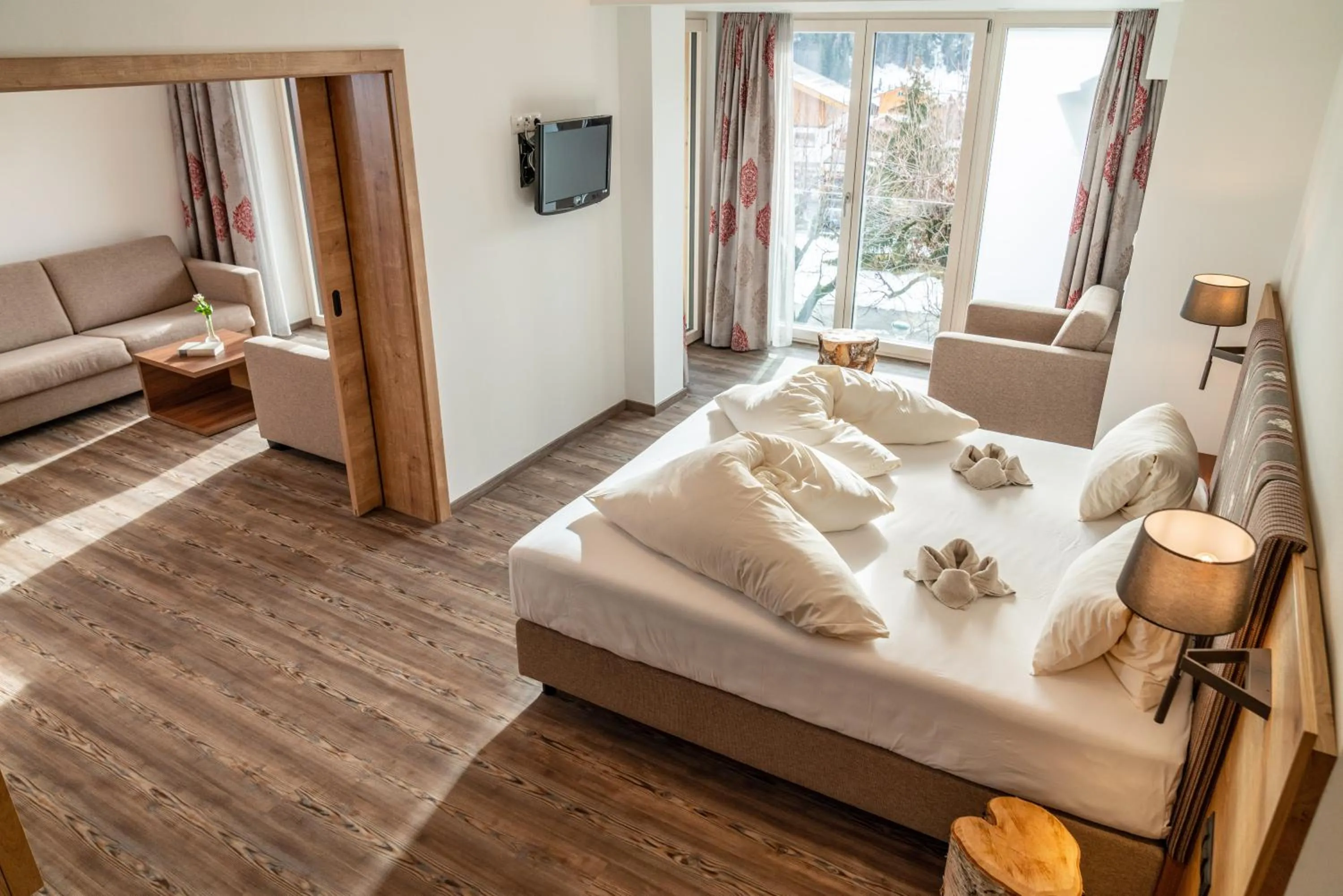 Photo of the whole room, Bed in Aktivhotel Pehab - Dachstein Rooftop-Spa