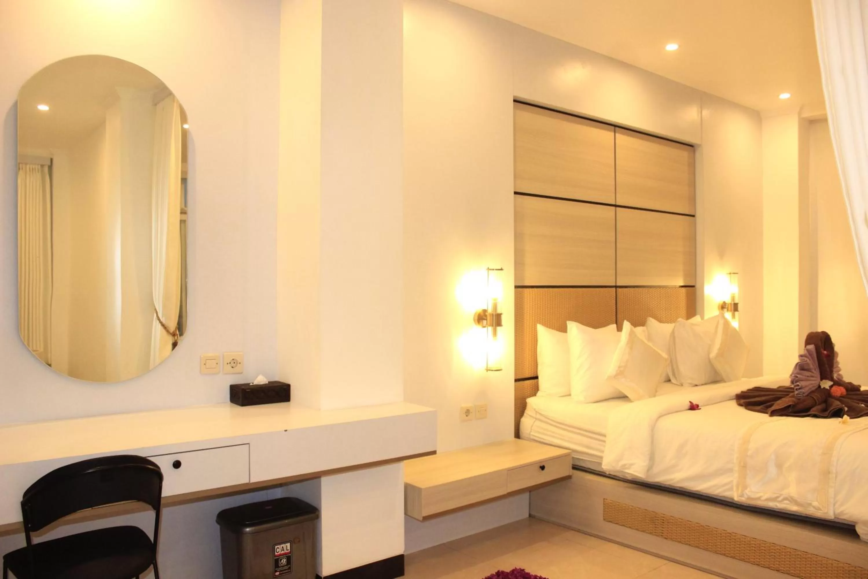 Bed in SUITE OCEAN BLUE