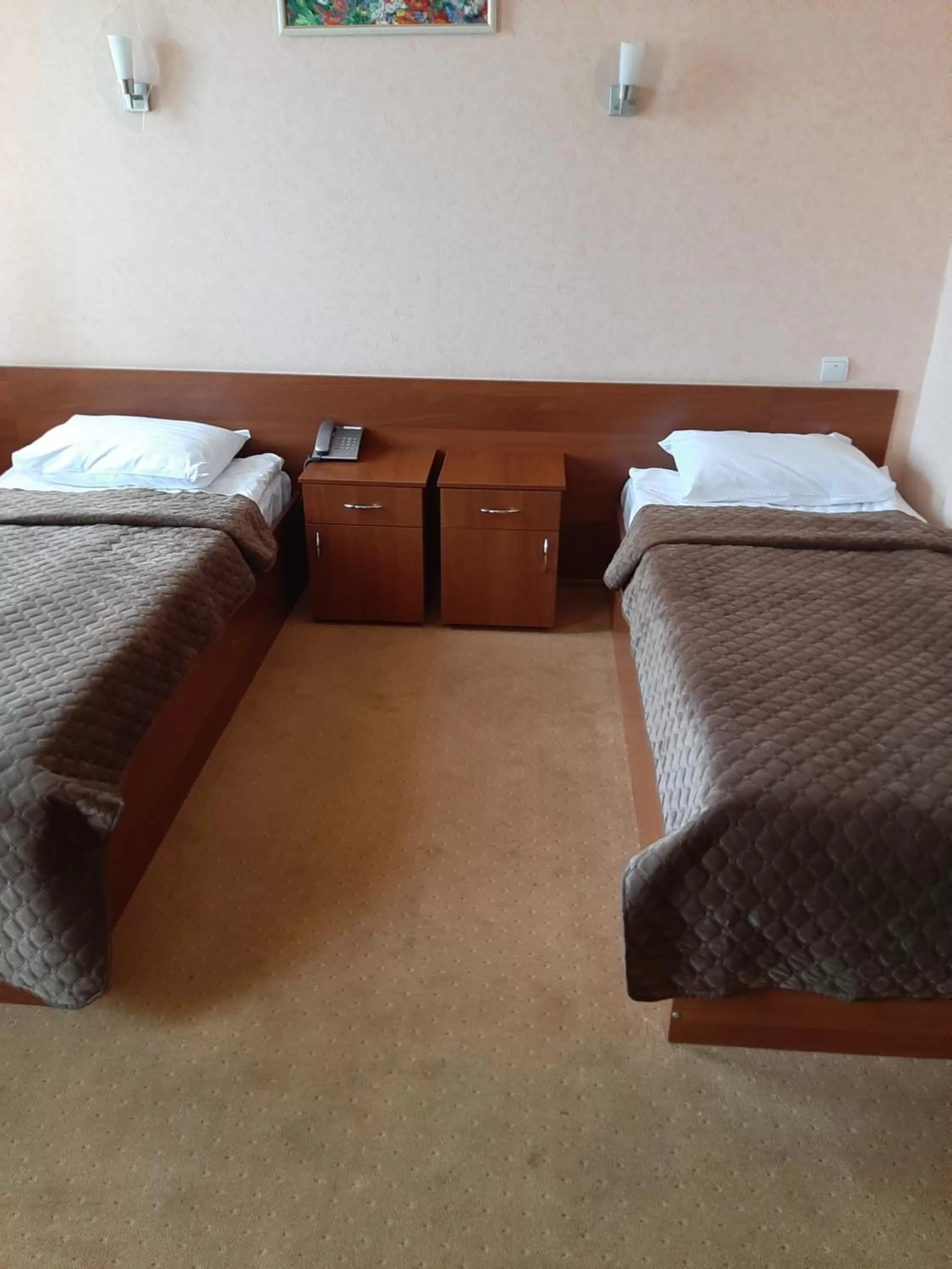 Bed in Stara Vezha Hotel