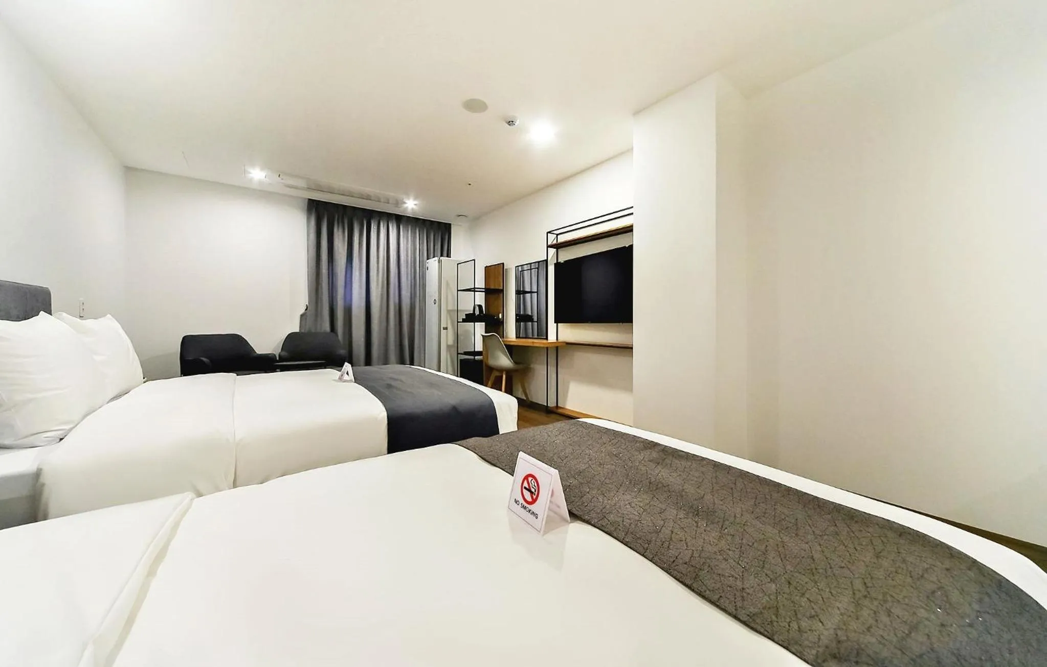 Bed in Hotel Noblestay