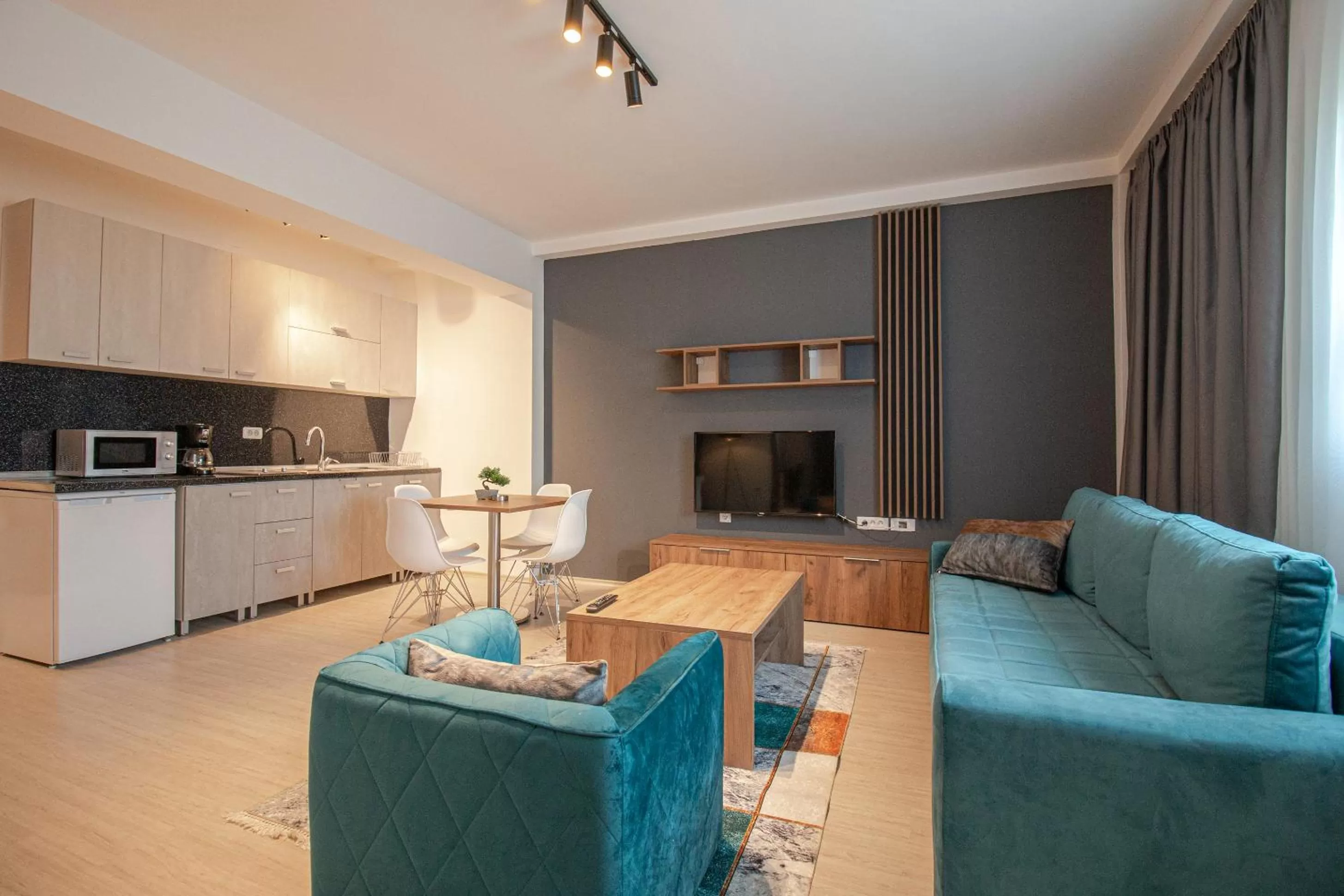 Kitchen or kitchenette in OASIS Apartments