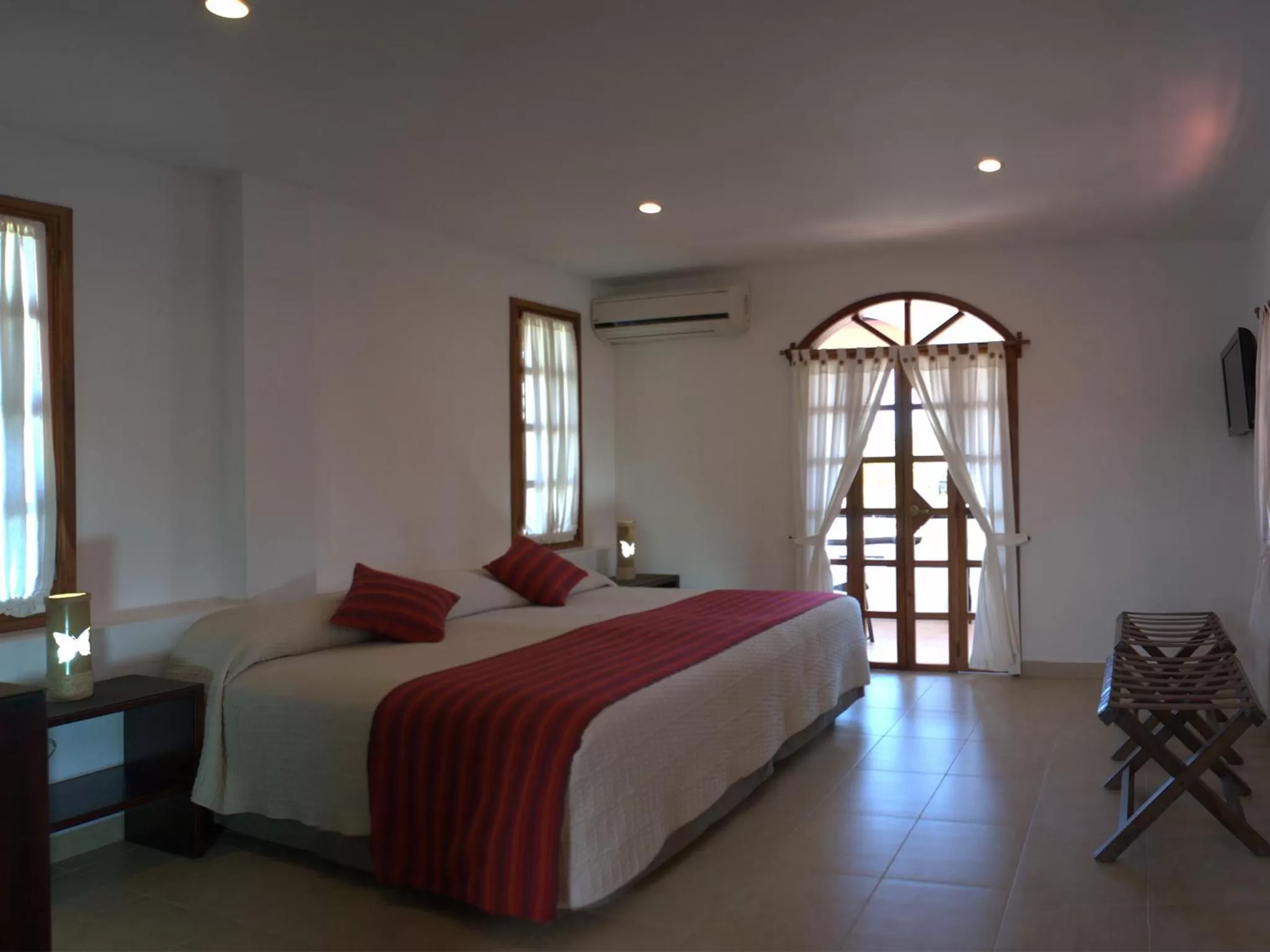 Bed in Hotel Galapagos Suites B&B