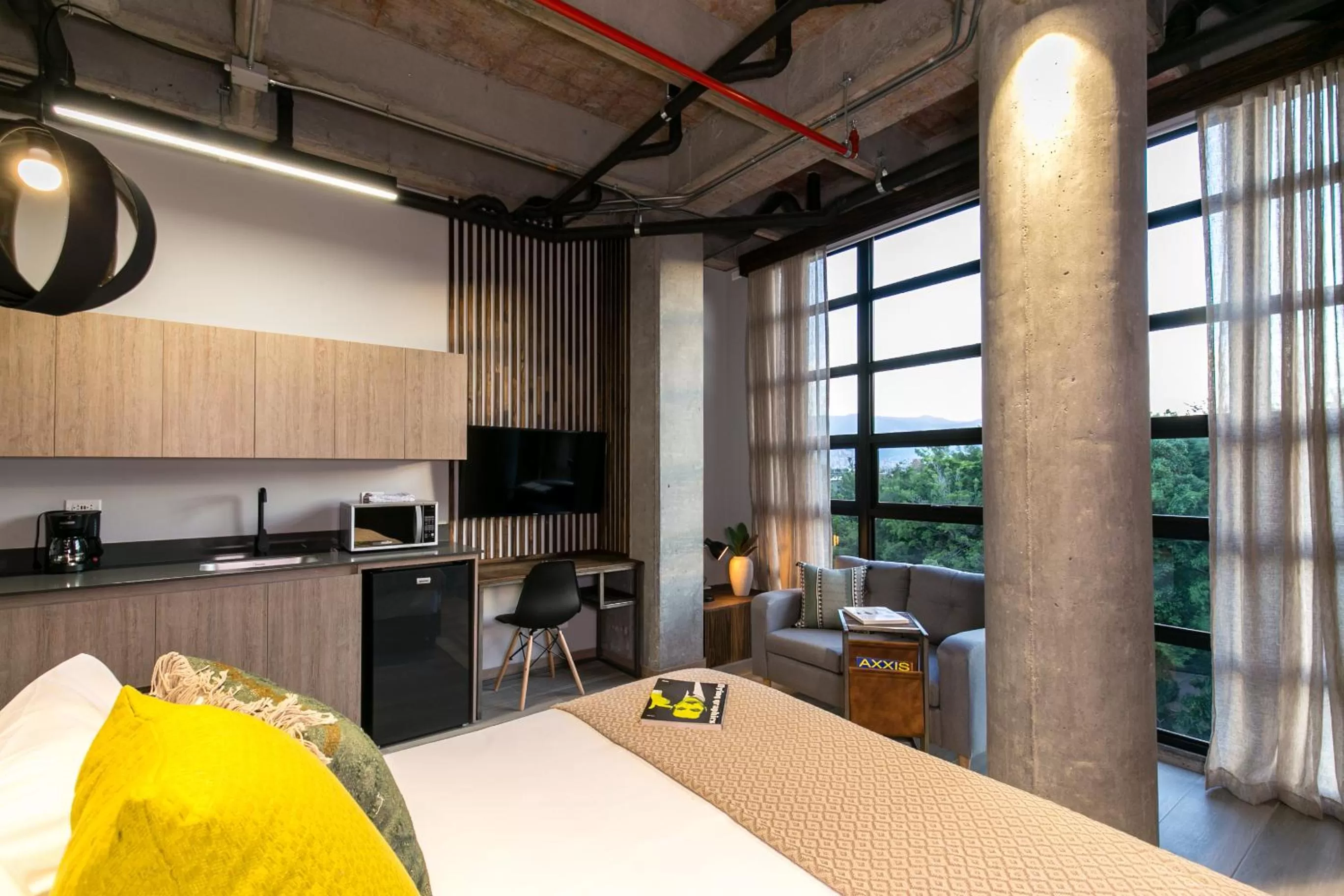 Bed in Factory Lofts Hotel