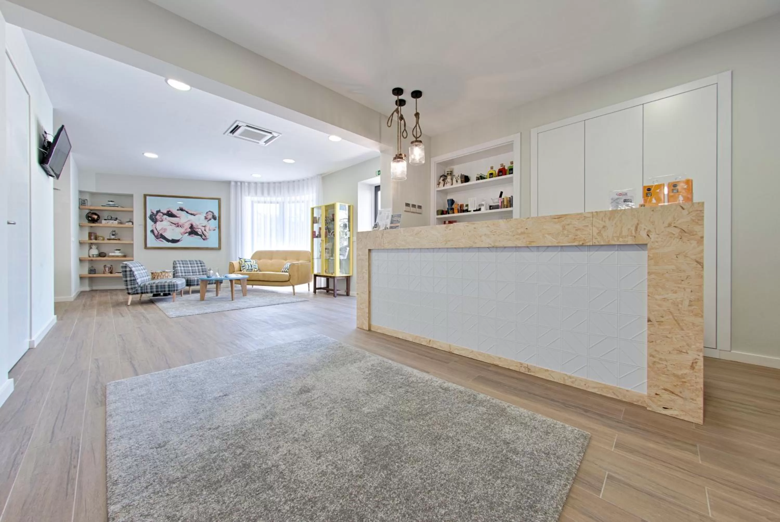 Communal lounge/ TV room in Hotel do Mercado