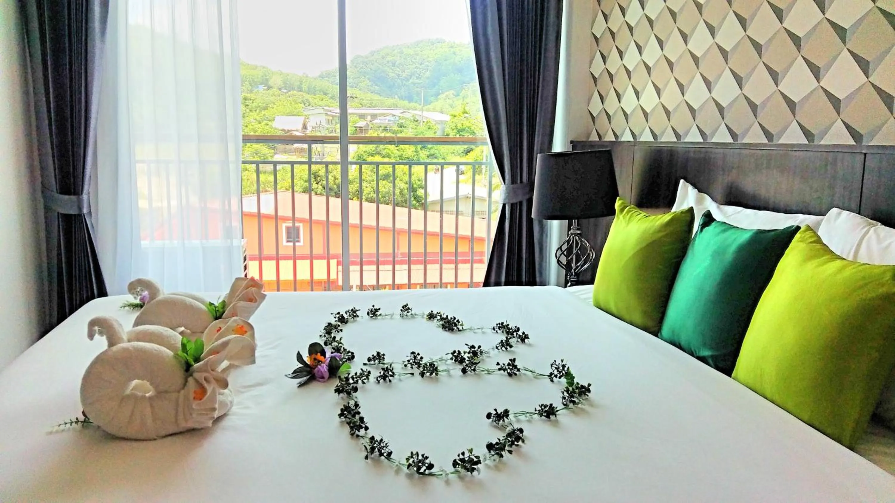 Bed in The Wings Boutique Hotels Krabi Ko Lanta