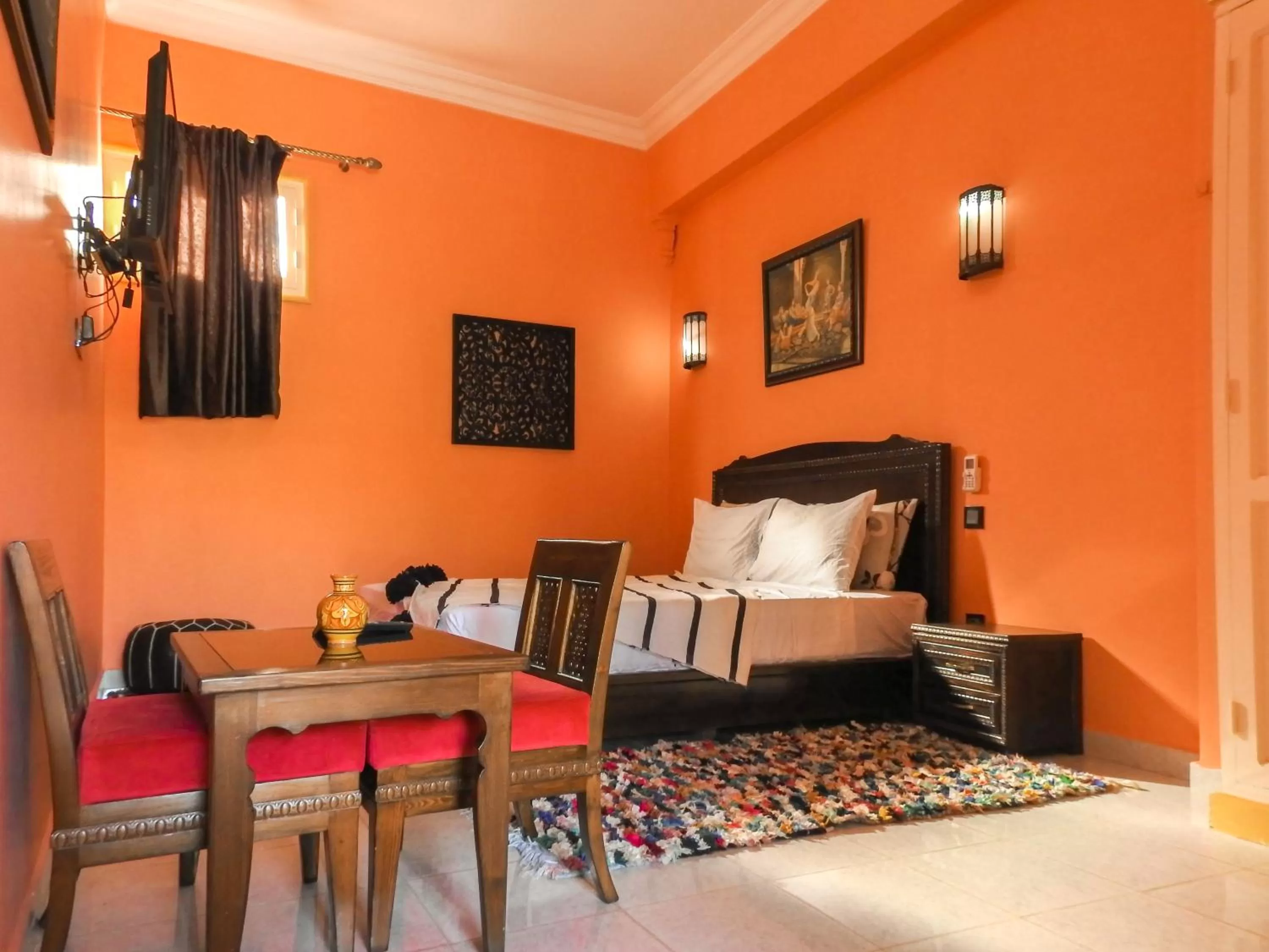 Bed, Seating Area in Le Bleu House